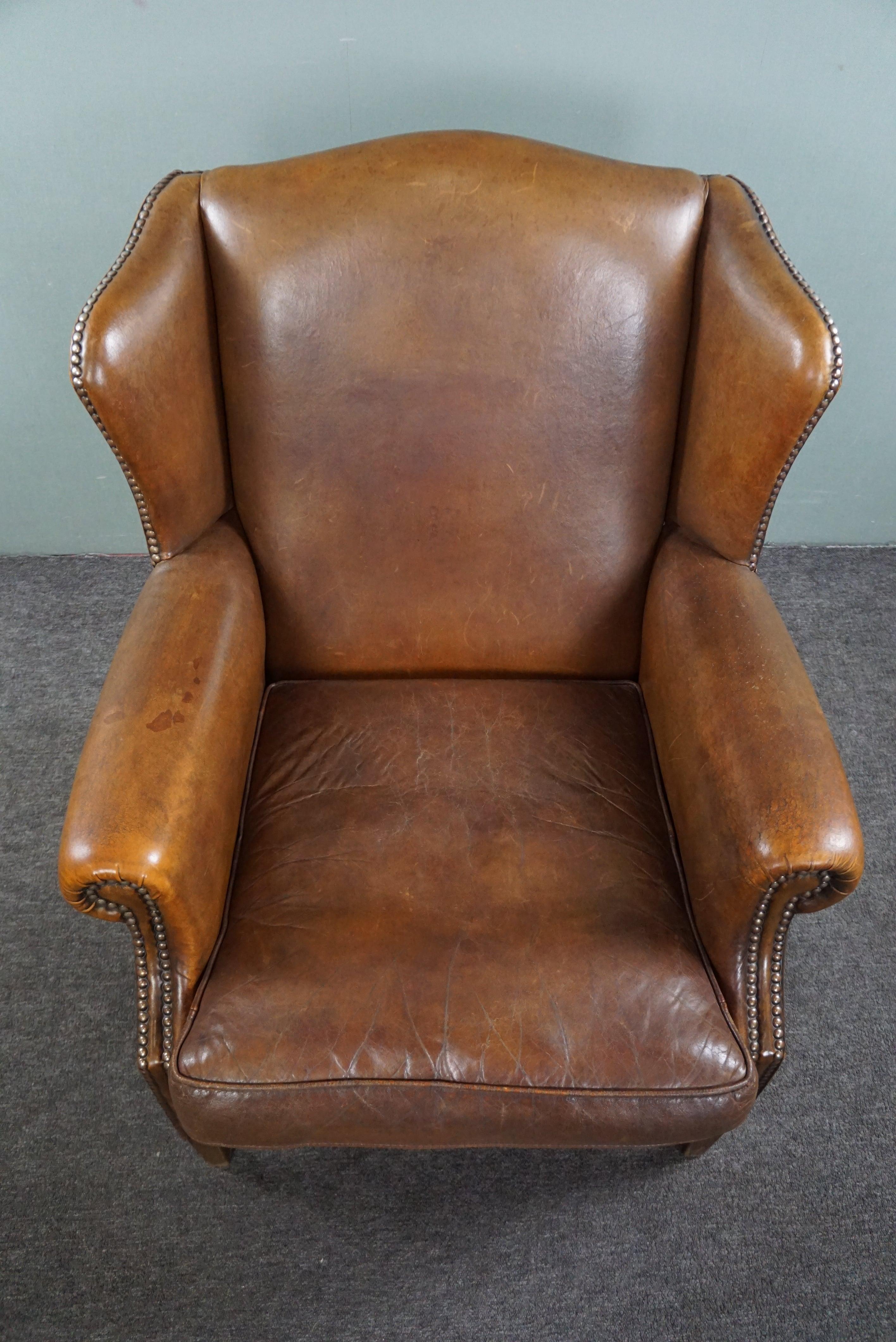 Contemporary Wing armchair full of character, made of sheep leather For Sale