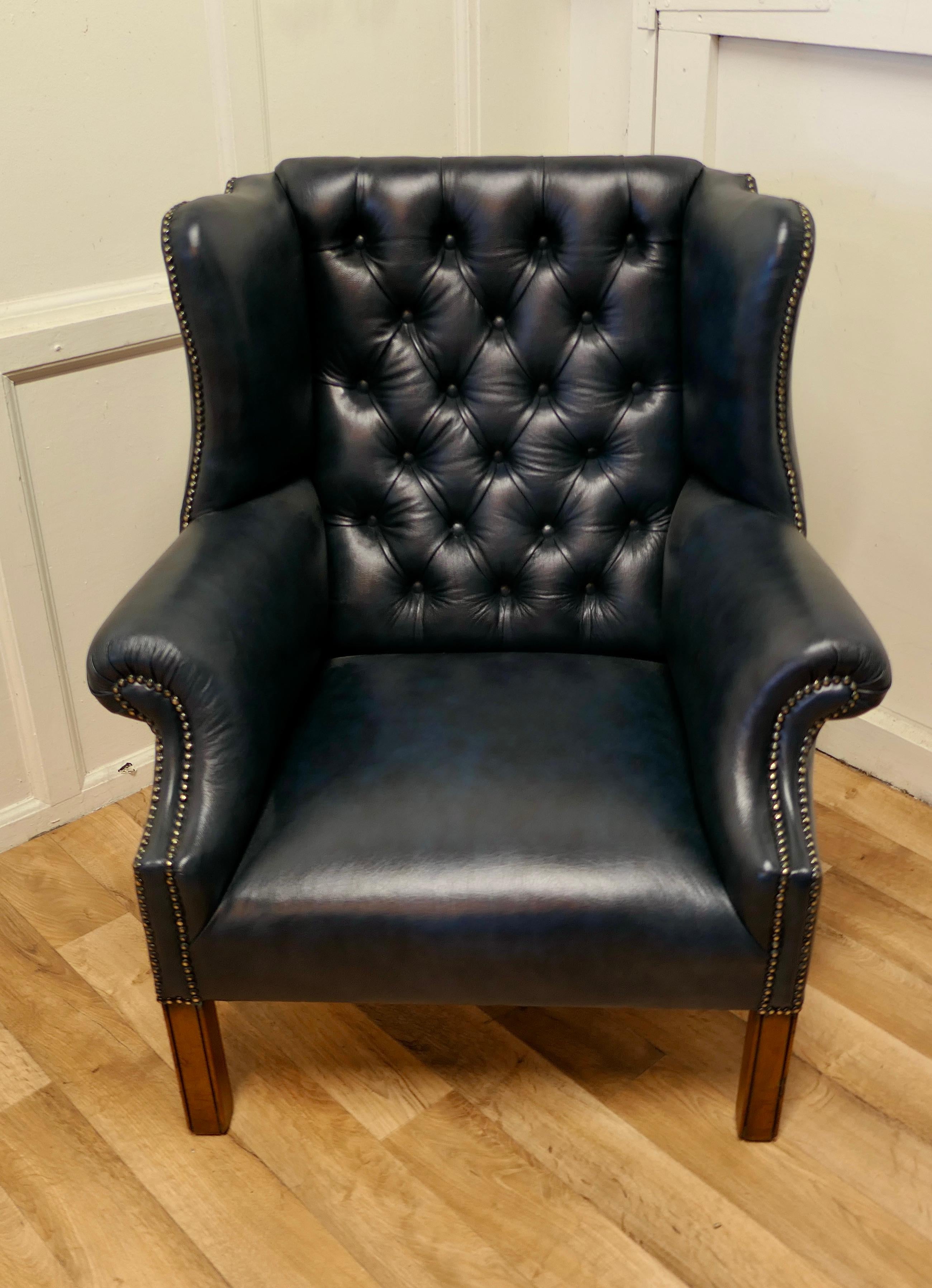 Wing back hall porters leather or chesterfield library chair

This is a very roomy chair, the ultimate in Vintage Country House Chic, the leather upholstery is new, it has been upholstered with superb soft quality hide in Antique Blue 
The chair