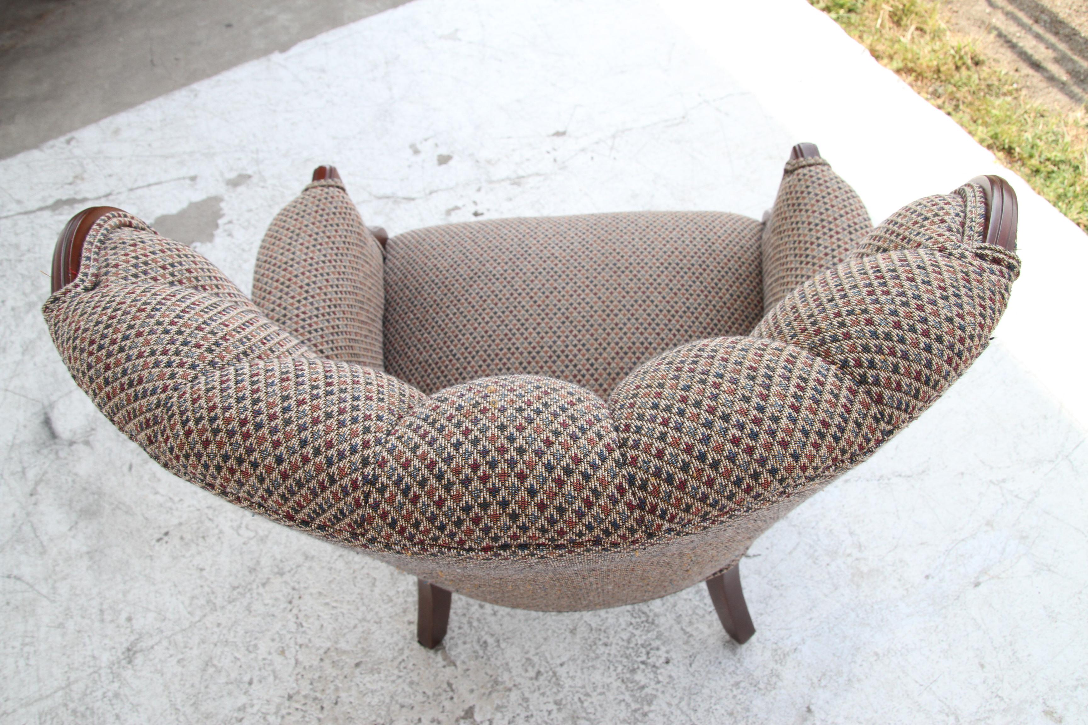 This is a nice wing back lounge chair with nice wood accents and channel back upholstery. A nice addition to the living area.