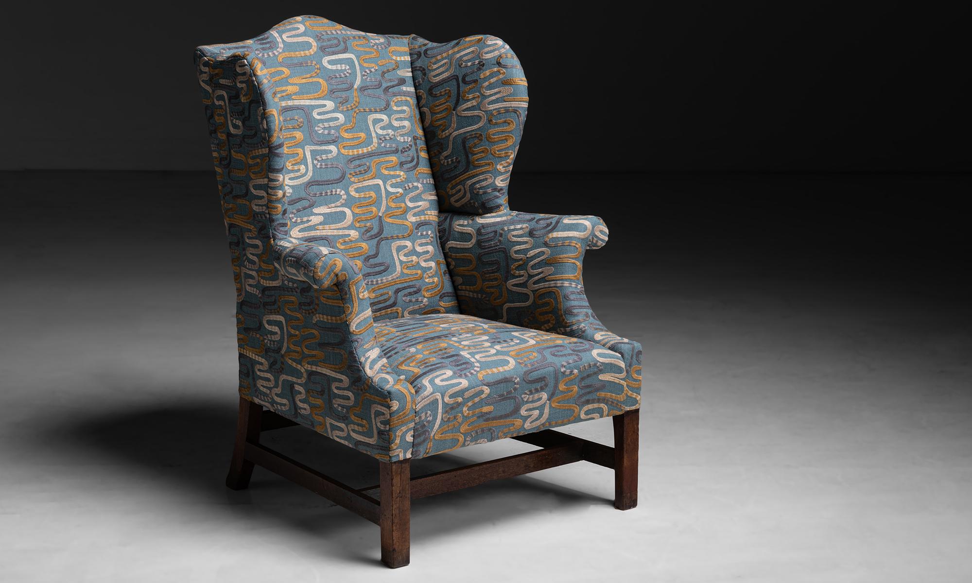 Wing Chair in Embroidered Linen by Pierre Frey

England circa 1810

Newly upholstered, on antique frame with square legs and h-stretcher in mahogany.

Measures 34”w x 30”d x 44.5”h x 15”seat