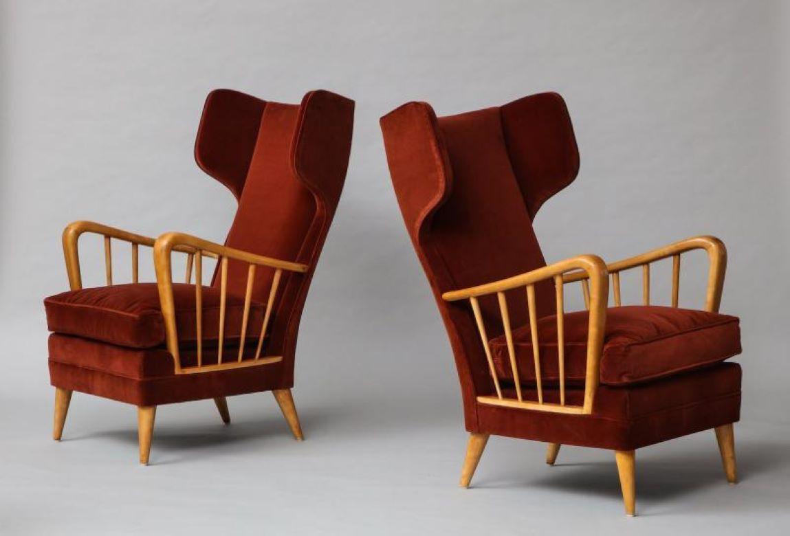 Wing Chairs, Model #6053B by Osvaldo Borsani for ABV.  A rare model with exaggerated wings forms. A pair of these chairs can be found in the main living room of the Villa Borsan, in Varedo, Italy. Maple & velvet upholstery.
Provenance: Private