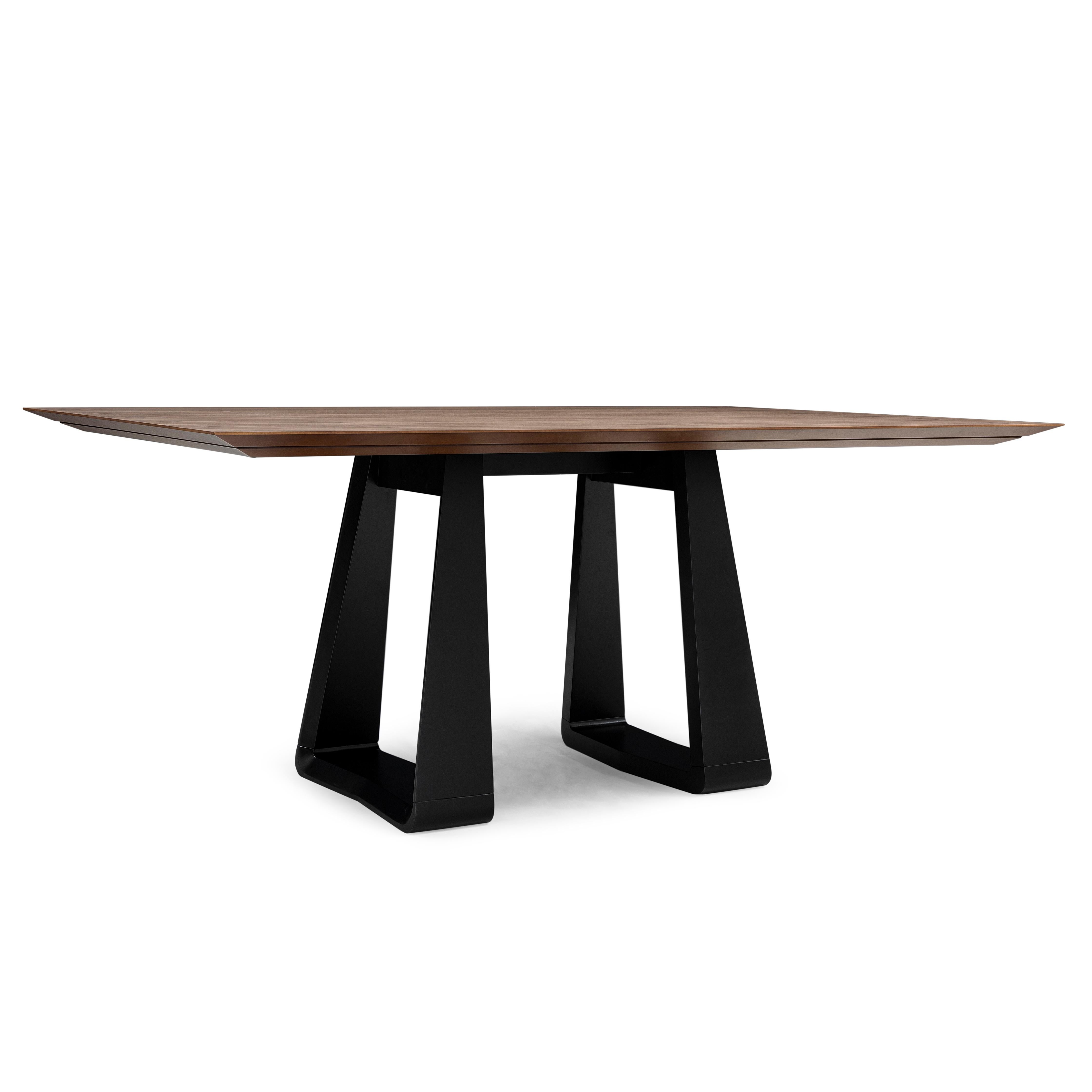 Élégante et sculpturale, la table de salle à manger Wing d'Uultis réunit des lignes épurées et des matériaux sophistiqués dans un format polyvalent de 87 pouces. Le plateau en placage de noyer chanfreiné flotte au-dessus d'une paire de bases