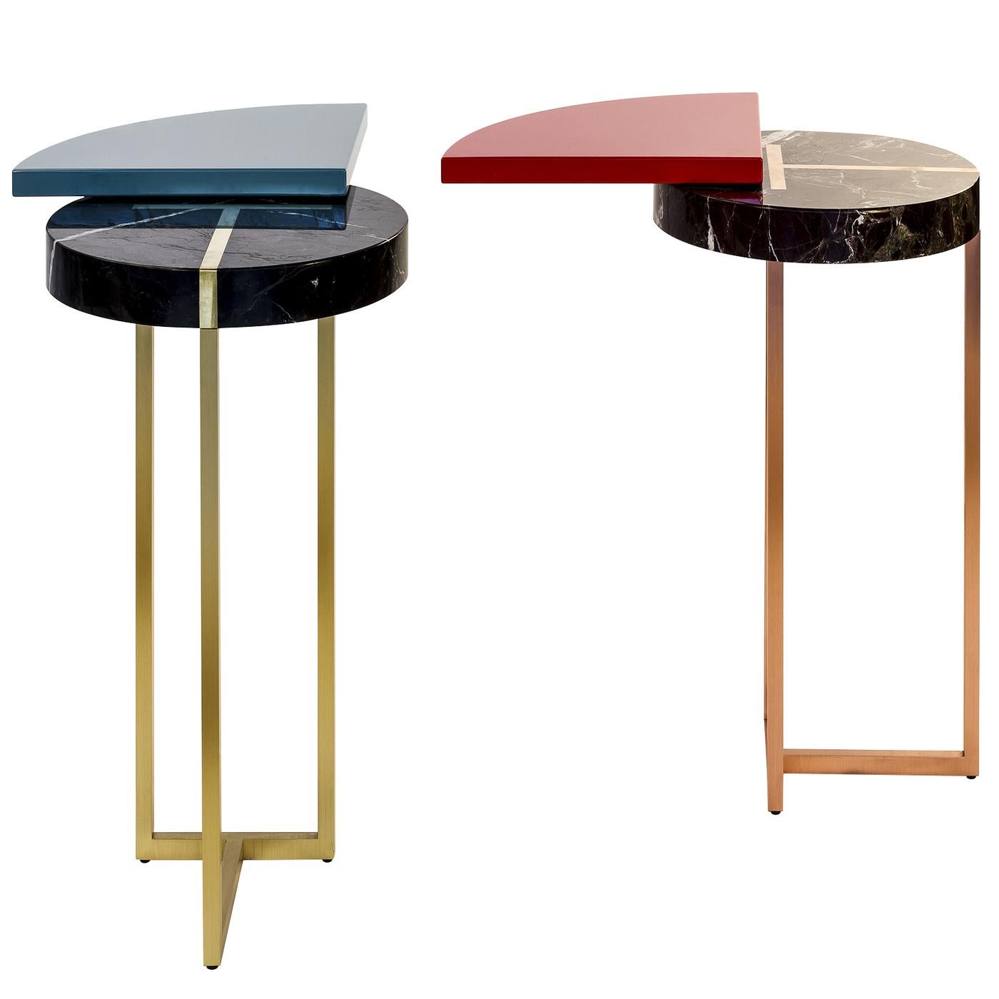 Part of the Intersections collection, the red wing end table is a contemporary piece creates a harmonious aesthetic. The brass base and Marquinia marble perfectly complement the vertical pivot that allows the rotation of the lacquered wood.