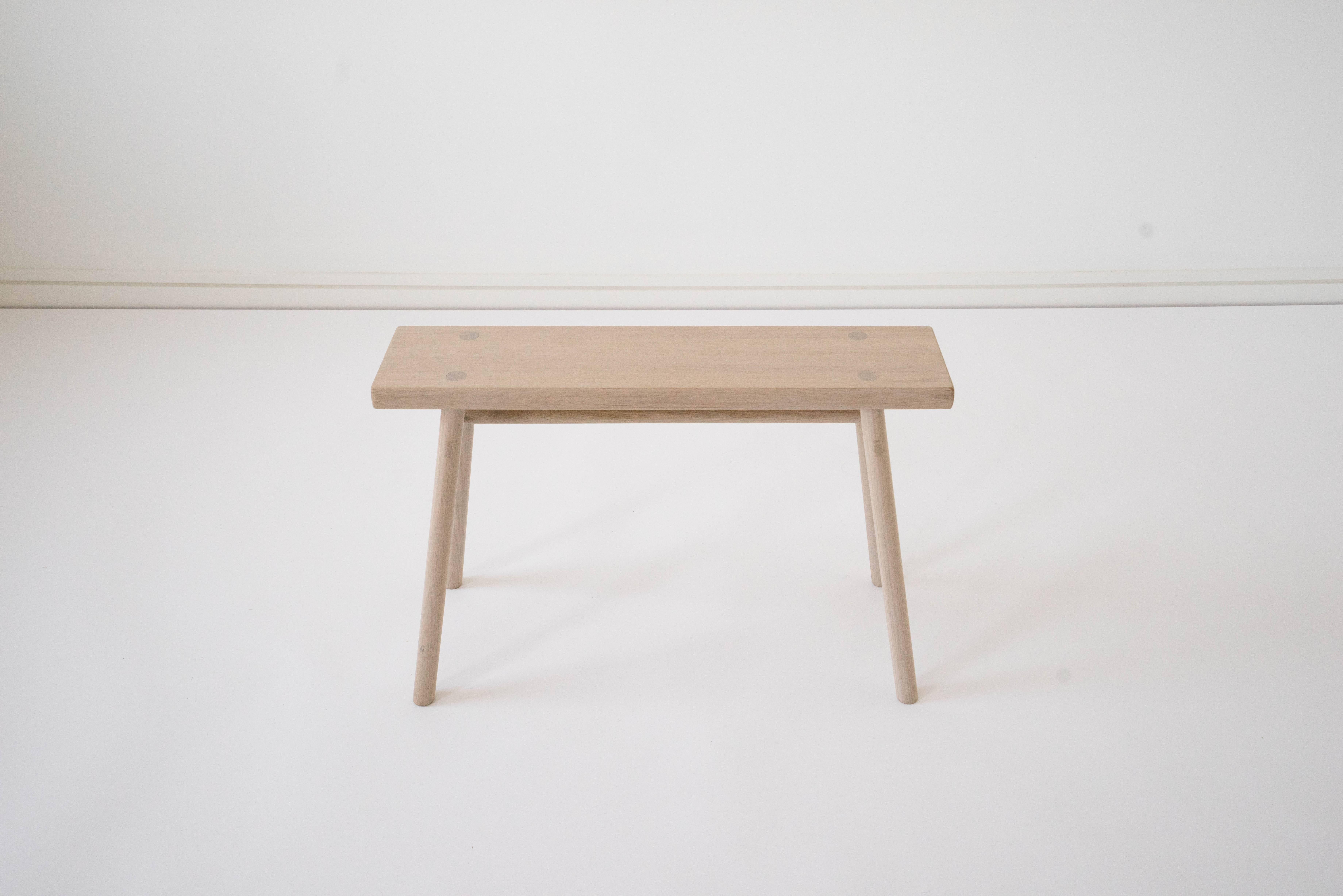 Sun at Six is a contemporary furniture design studio that works with traditional Chinese joinery masters to handcraft our pieces using traditional joinery. Handcrafted using traditional joinery. Designed at a size that allows this stool to serve as