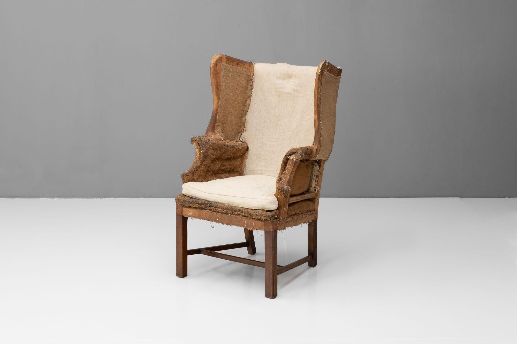 Wingback armchair on mahogany legs with H stretchers.
Circa 1900.
H 108cm SH 50cm x W 66cm x D 68cm
Please be in touch for an accurate shipping quote.