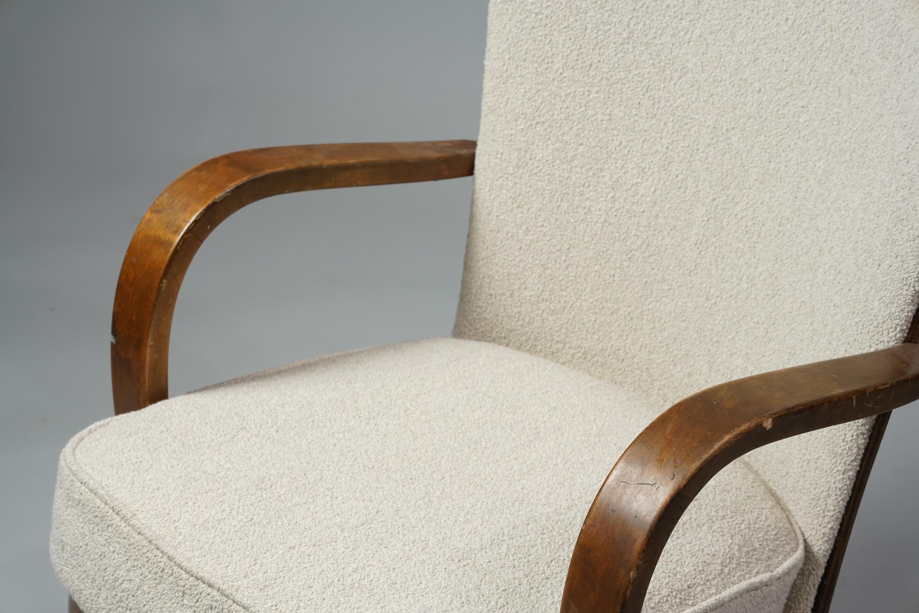 Armchair, designed by Werner West, 1930/1940s. Birch frame, reupholstered with quality Lauritzon's Orsetto 012- fabric. Good vintage condition, minor patina and wear on the frame consistent with age and use. Classic Finnish Scandinavian Modern