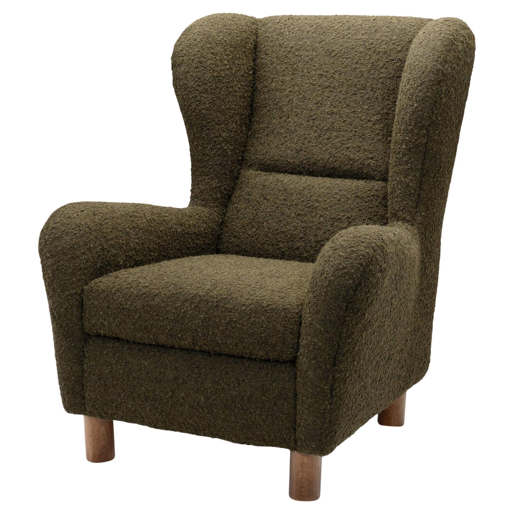 Wingback Armchair with Beech Legs, Denmark Second half of the 20th Century For Sale