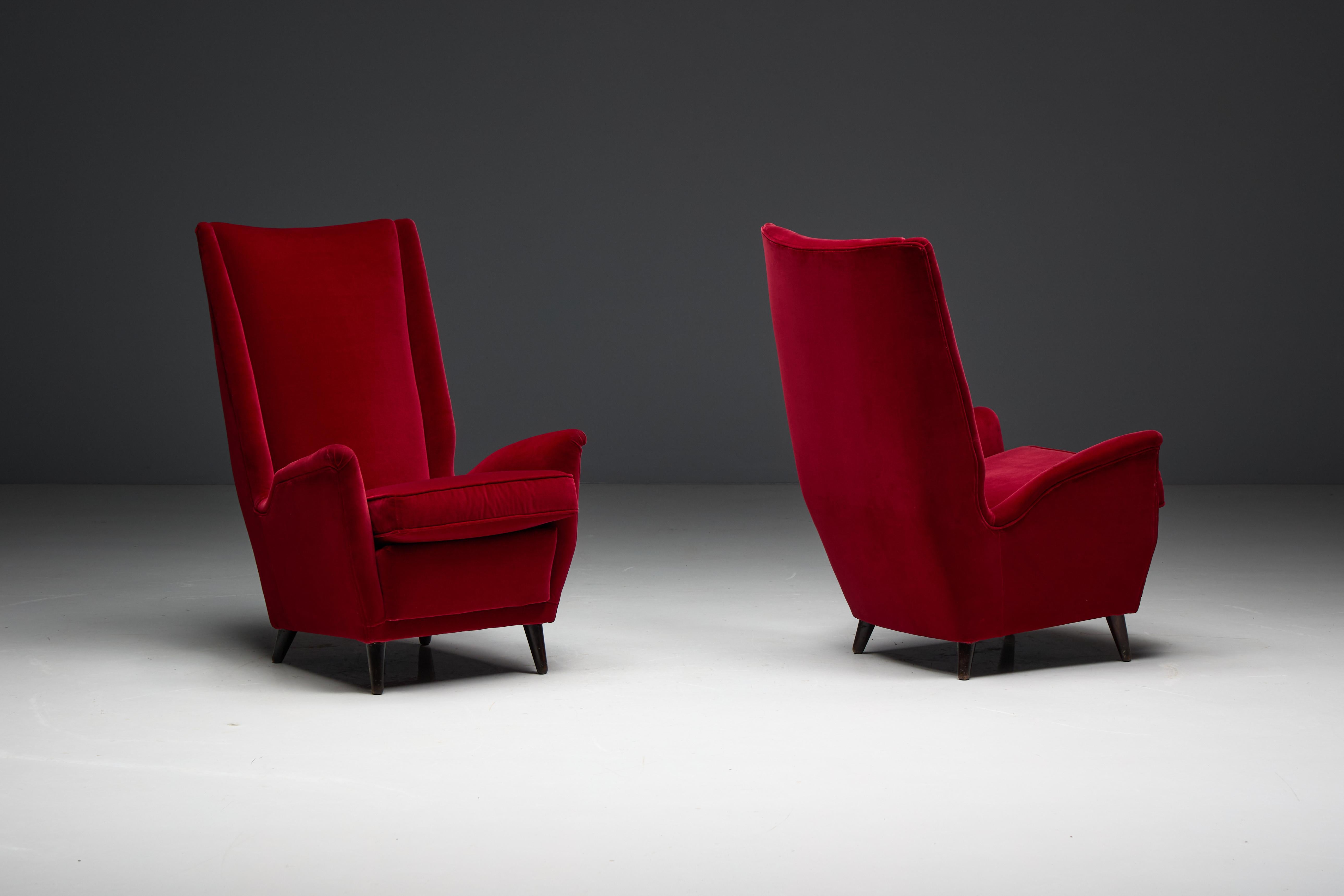 This exquisite high-back wing chair, designed by the legendary Gio Ponti, exemplifies timeless Italian elegance and masterful craftsmanship. Featuring a slightly tilted backrest for optimal support and comfort, the chair invites relaxation without