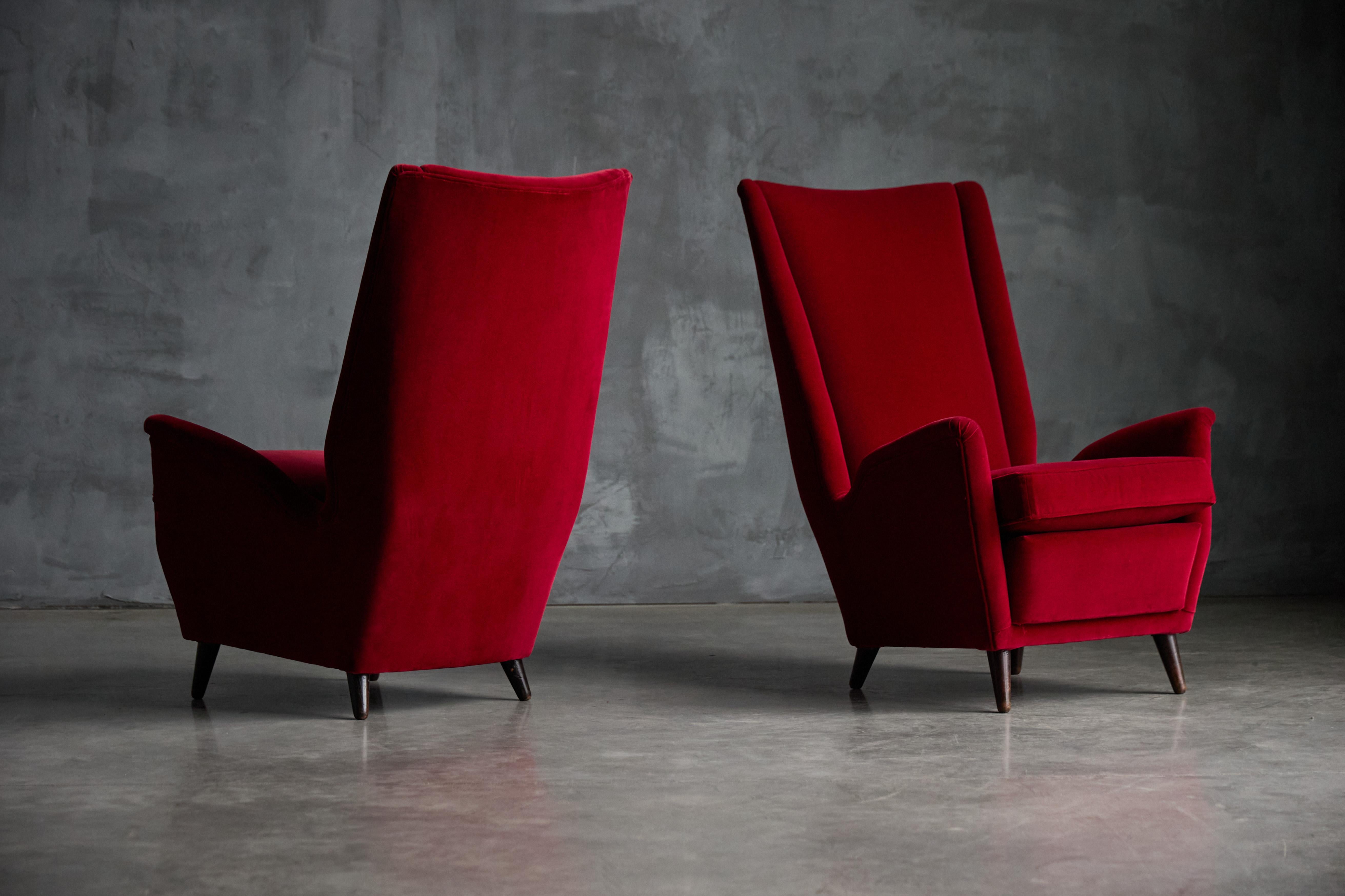 red velvet wingback chair