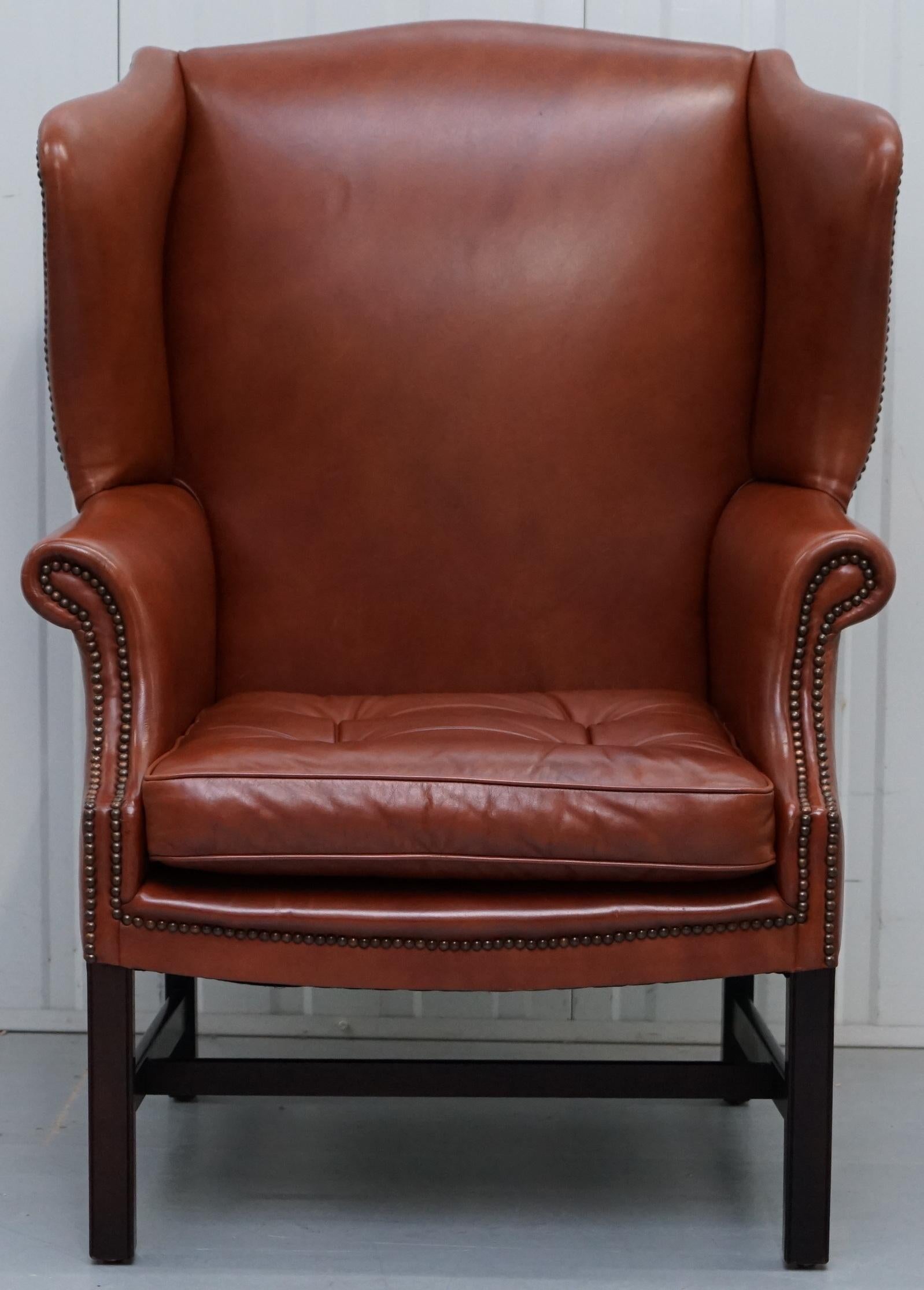 We are delighted to offer for salebthis really quite stunning wingback armchair with feather filled Thomas Chippendale style floating button cushion

A very well made piece, the frame is solid mahogany, the leather is 100% cattle hide fully