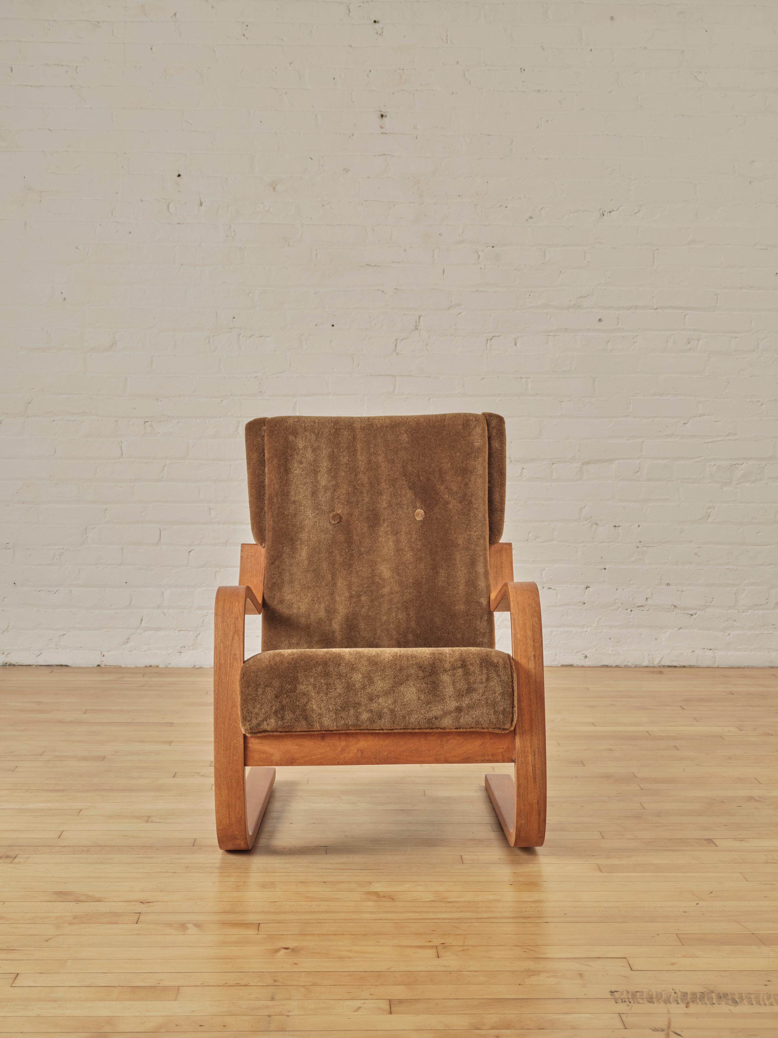 Wingback Chair by Alvar Aalto (Model 401) reupholstered in chocolate brown Mohair

About Alvar Aalto: 

Hugo Alvar Henrik Aalto was a Finnish architect and designer. His work includes architecture, furniture, textiles and glassware, as well as