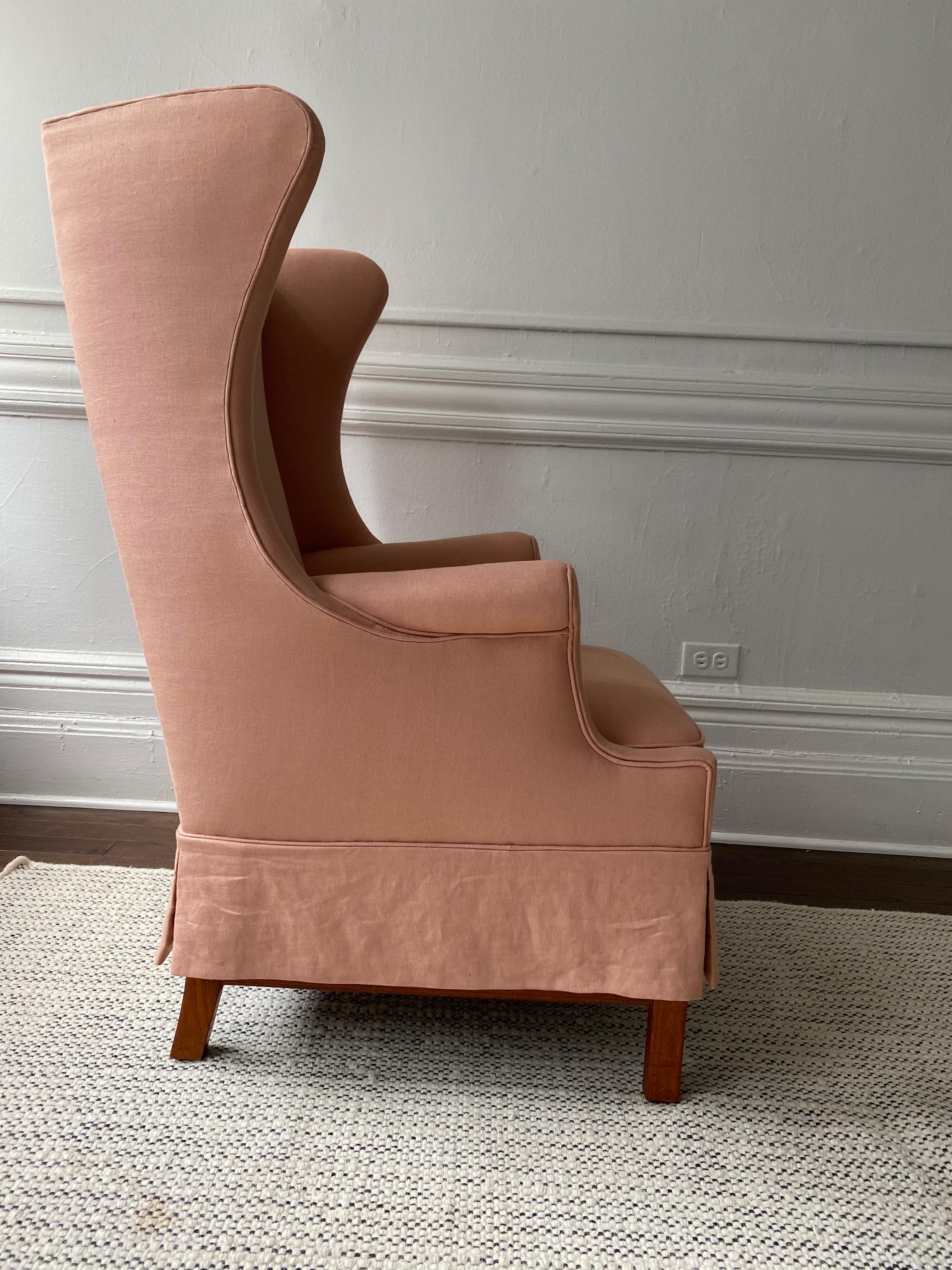 Wingback chair designed by Hans Thomas Jensen and made by Jacob Kjaer 

Cuban mahogany legs with new linen upholstery

Denmark, 1942.