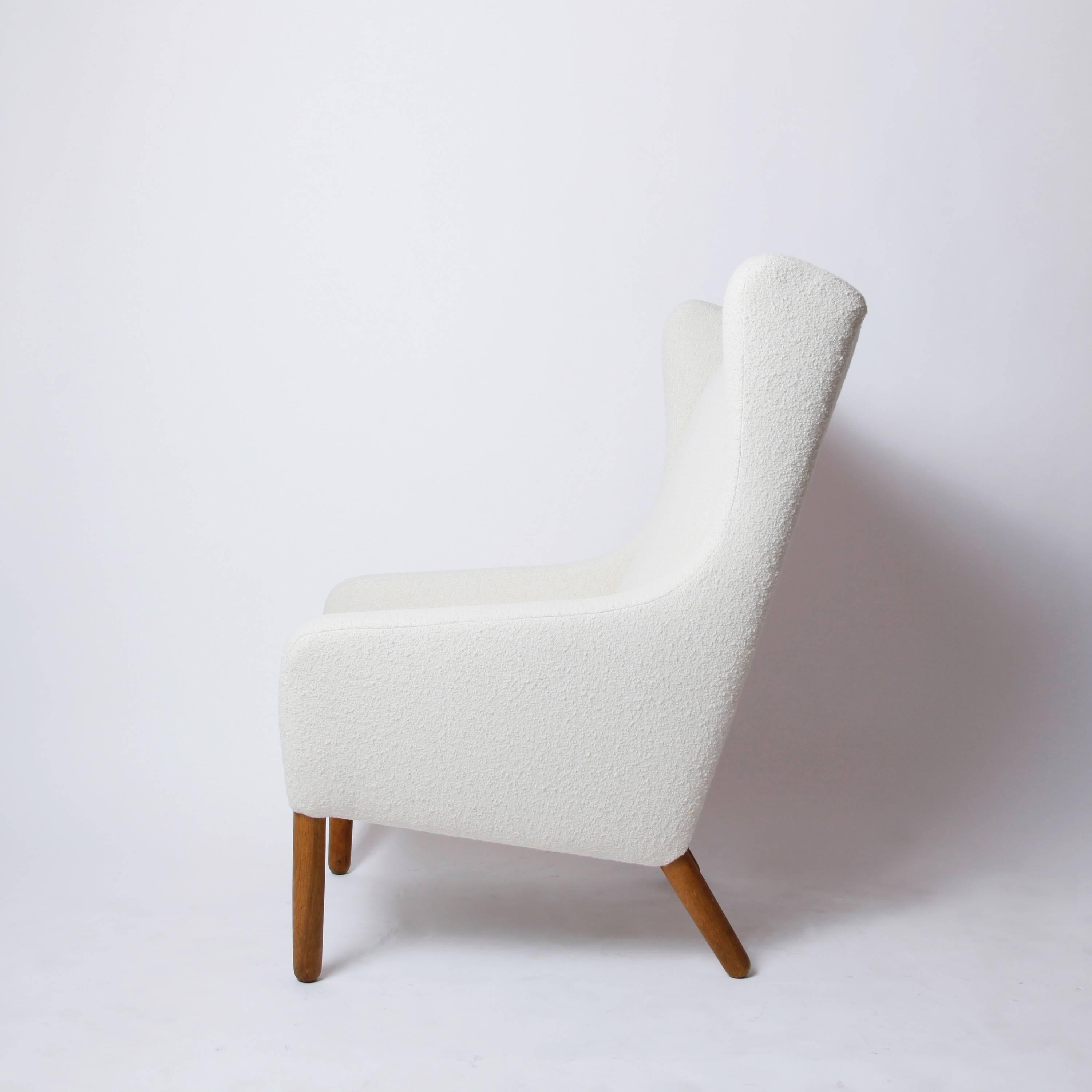 We love the clean lines and soft curves of this Danish wingback chair. It is extremely modern, but as welcoming as one of the centuries-older iterations that probably inspired its design. The sturdy cylindrical front legs follow the line of the