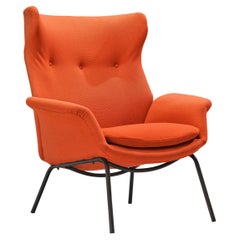 Wingback Chair in Orange Fabric and Metal