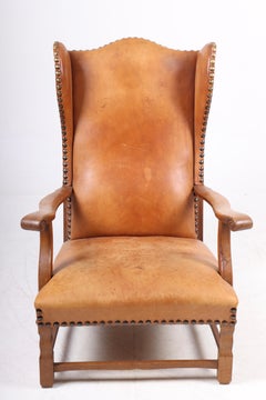 Wingback Chair in Solid Oak and Patinated Leather, Danish Cabinetmaker, 1940s
