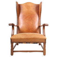 Wingback Chair in Solid Oak and Patinated Leather, Danish Cabinetmaker, 1940s