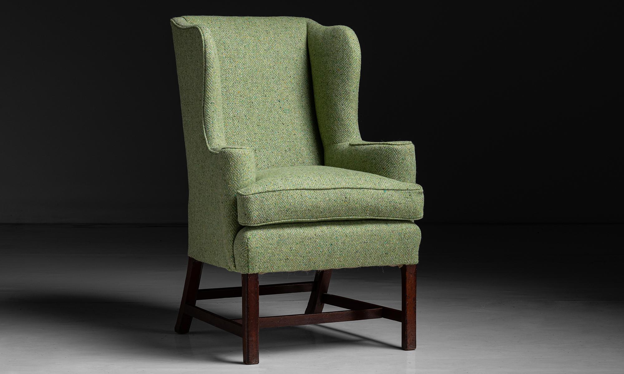 Wingback Chair in Tweed by Pierre Frey

England circa 1760

George III chair, newly upholstered on original mahogany base.

Measures 28.5”w x 29”d x 46.5”h x 24”seat