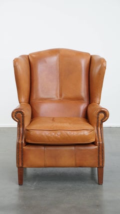 Chaise Wingback en cuir de vachette