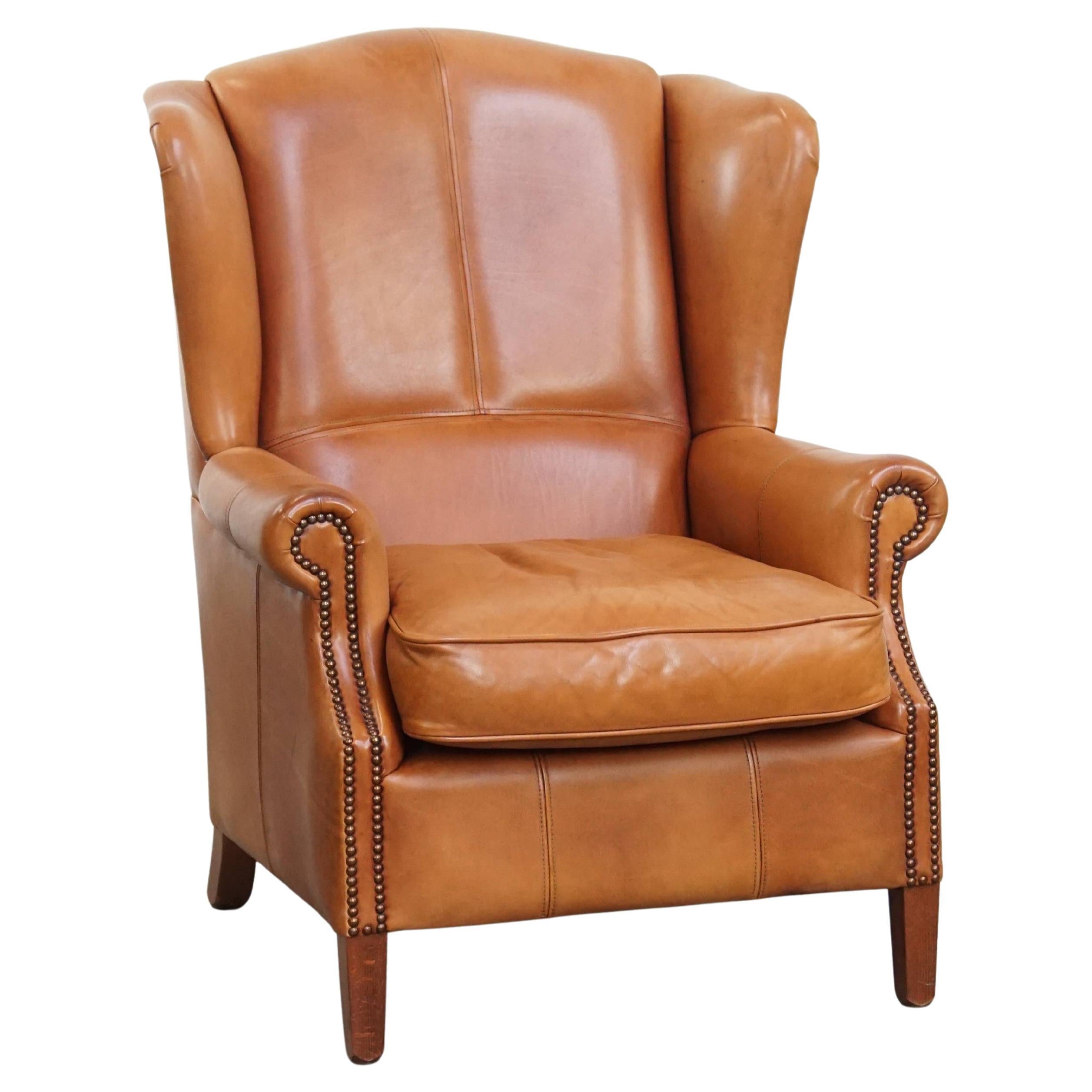Chaise Wingback en cuir de vachette en vente