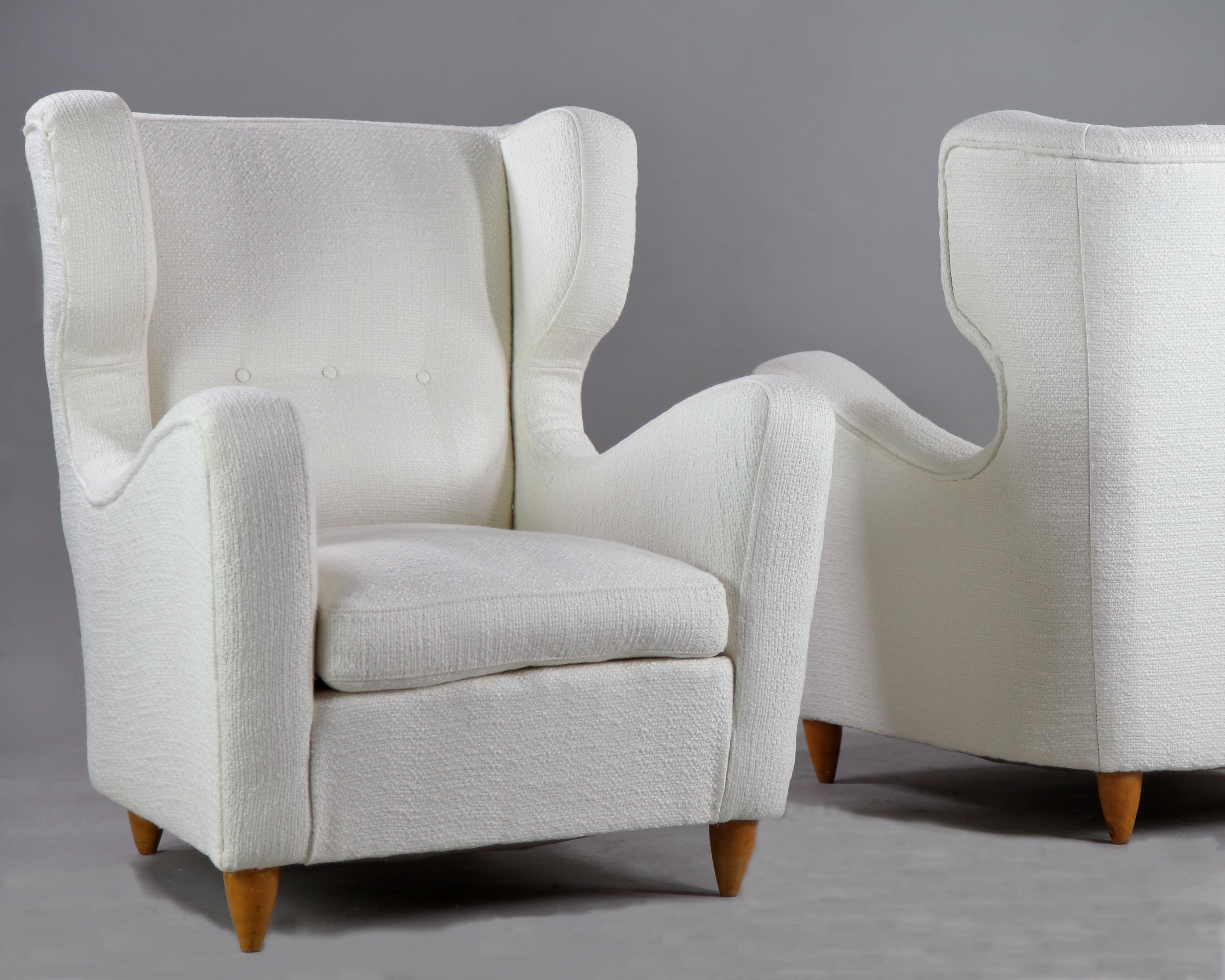 Pair of wingback chairs designed by Melchiorre Bega, Italy 1940s, completely restored and upholstered in Metaphore fabric.