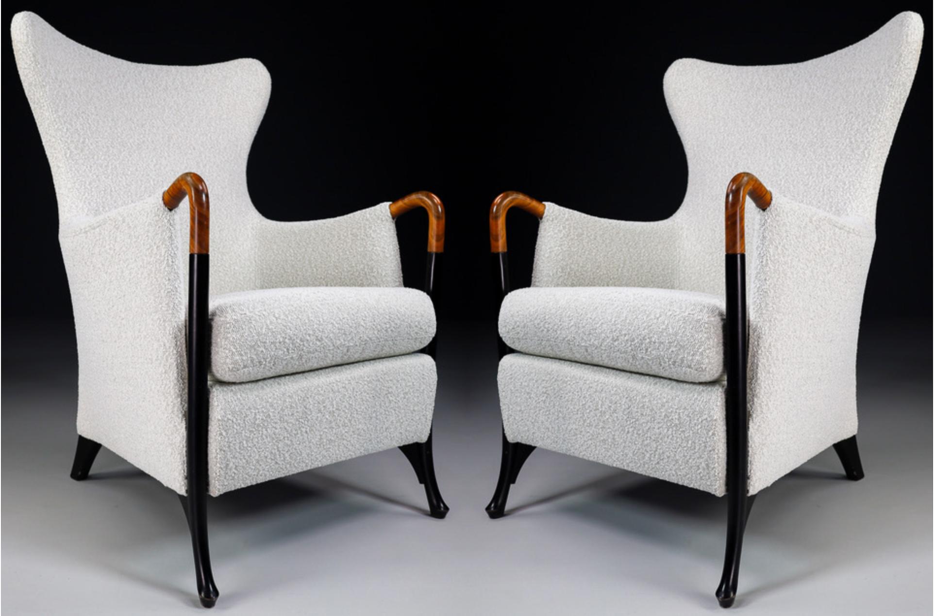 Pair of two Modern Progetti wingback chairs / arm chairs by Umberto Asnago For Giorgetti In New Bouclé Wool Fabric. Stylish and very comfortable chair and elegant curved wooden legs. The structure is in very good condition. These wingback chairs has