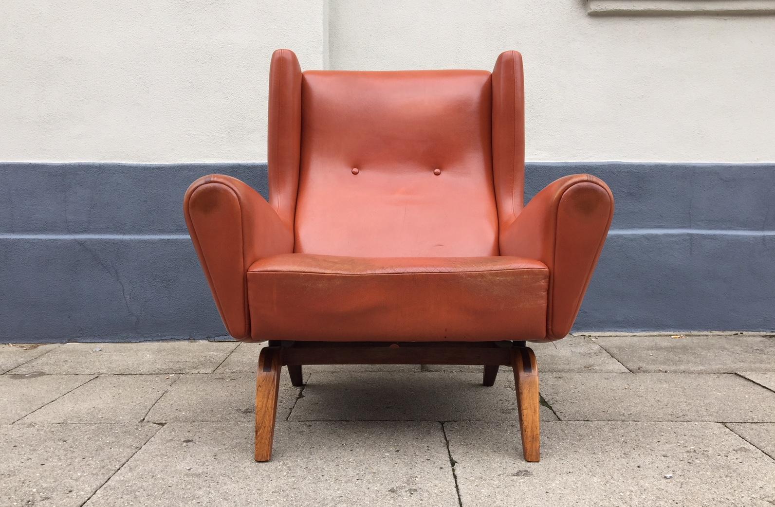 Mid-Century Modern Wingback Leather and Rosewood Easy Chair by Illum Wikkelsø for Søren Wlladsen