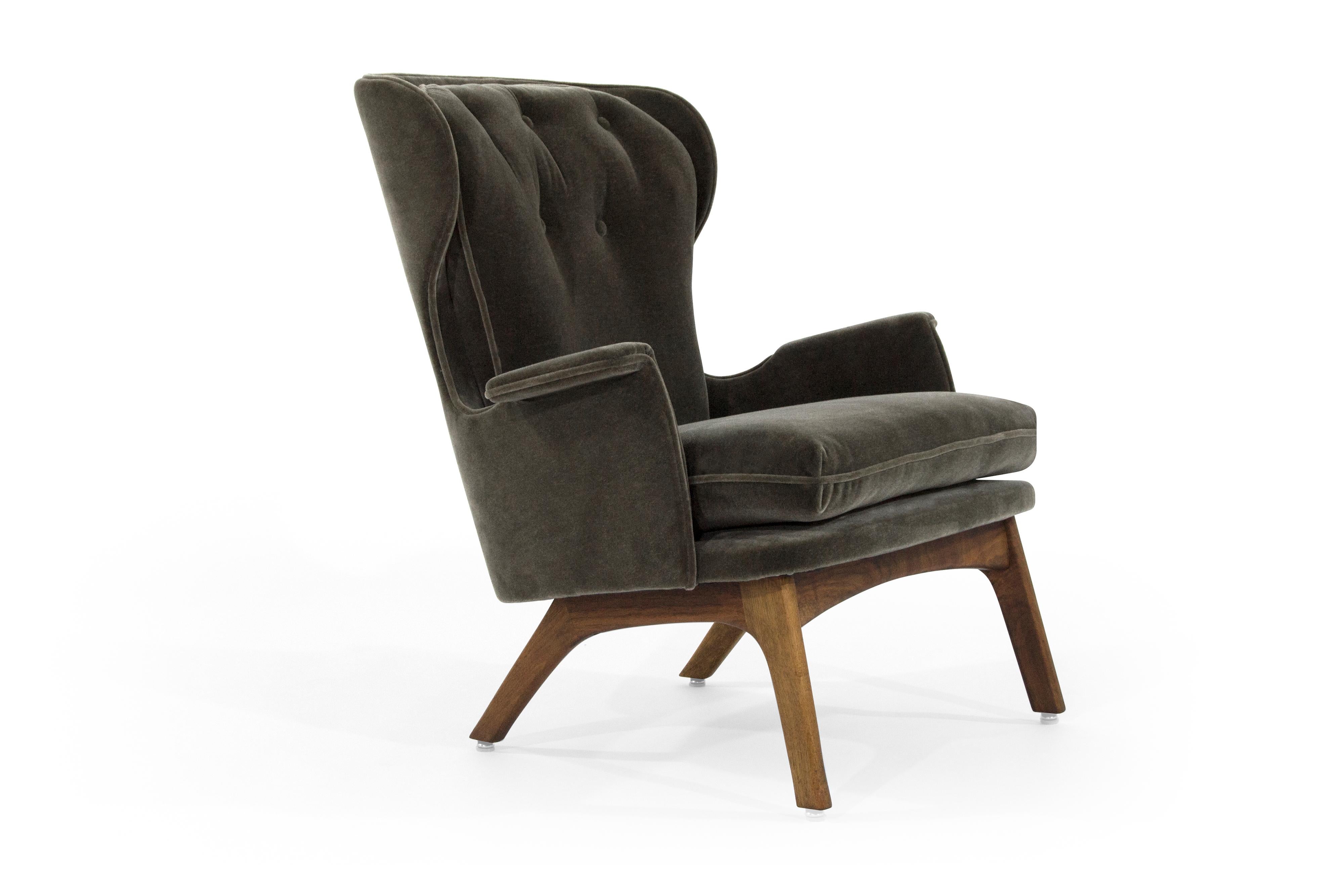 An exceptionally comfortable lounge chair designed by Adrian Pearsall, circa 1950s.

Newly upholstered in brown mohair, walnut base fully restored.