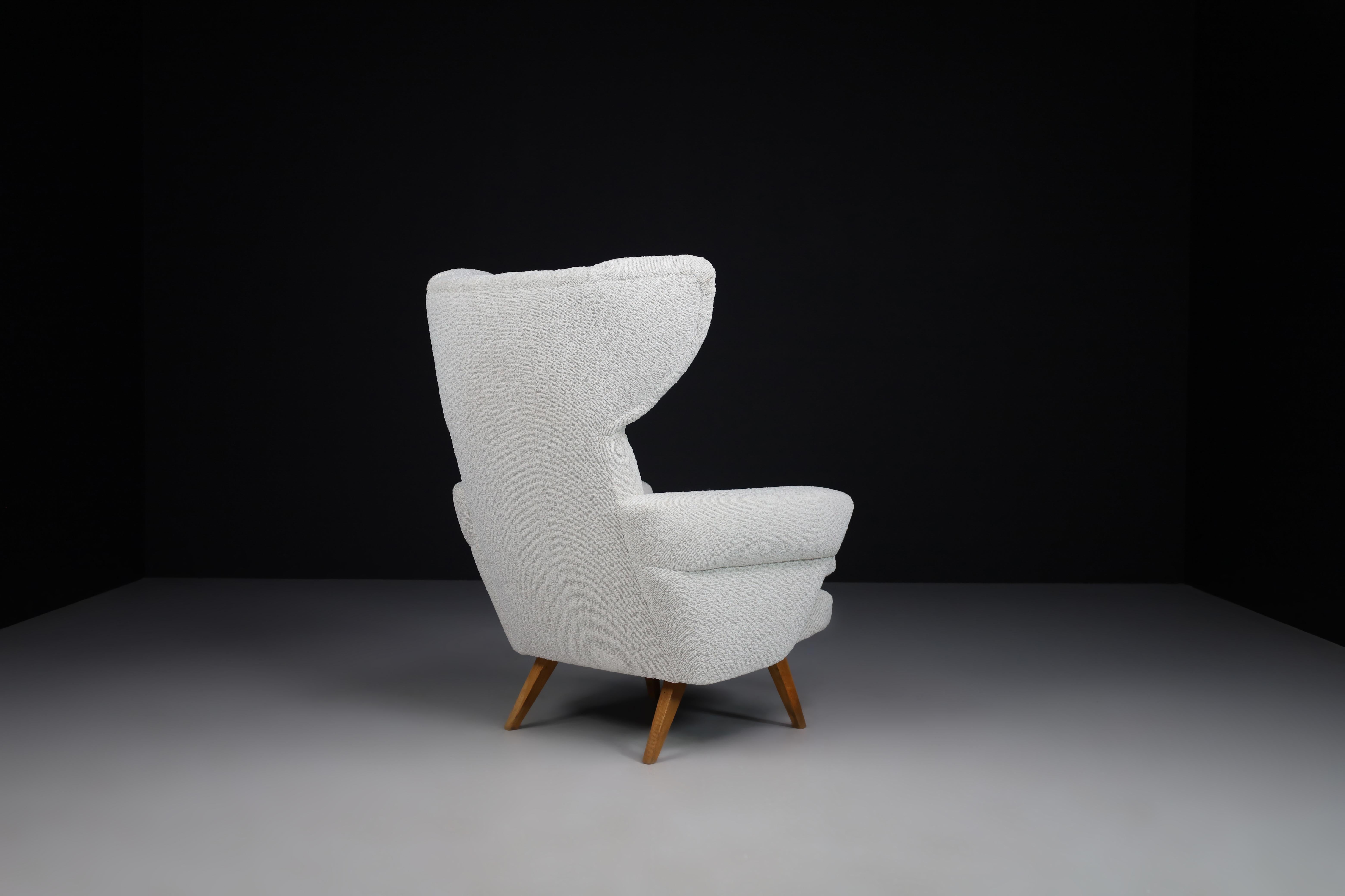 Czech Wingback Lounge Chair in Reupholstered Bouclé Fabric, Praque 1950s For Sale