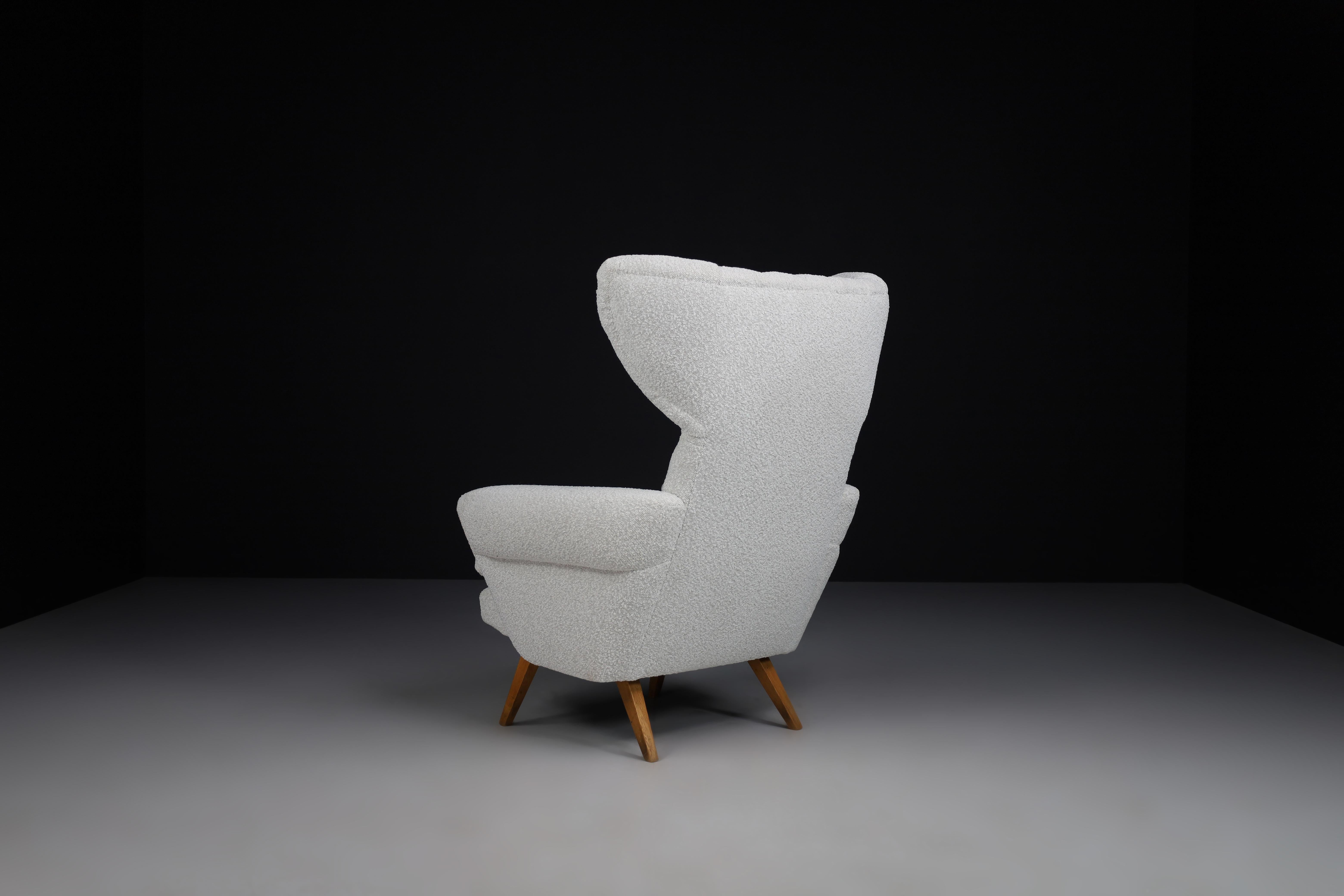 Mid-20th Century Wingback Lounge Chair in Reupholstered Bouclé Fabric, Praque 1950s For Sale