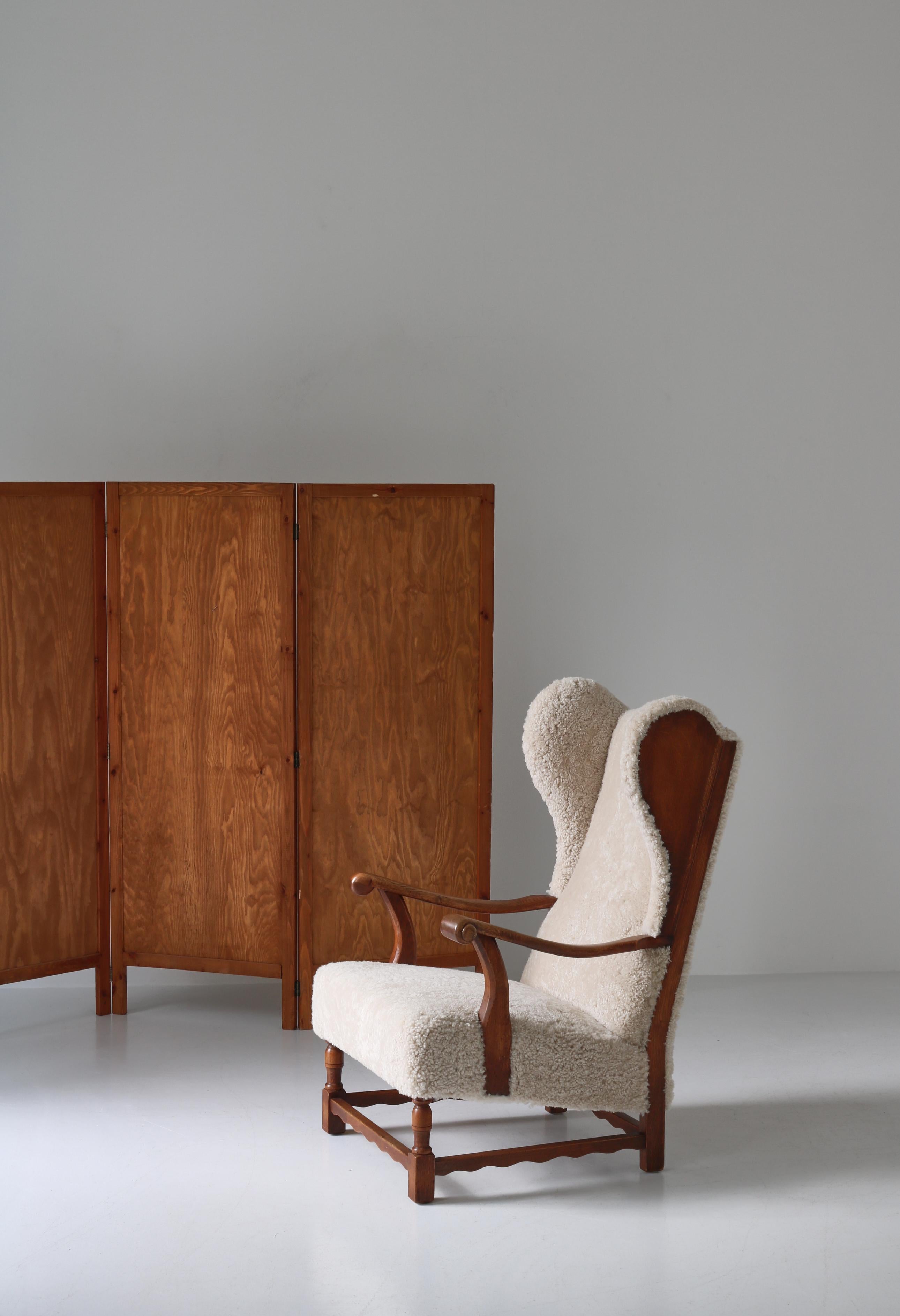 Wingback Lounge Chairs in Solid Oak and Sheepskin by Danish Cabinetmaker, 1940s 1