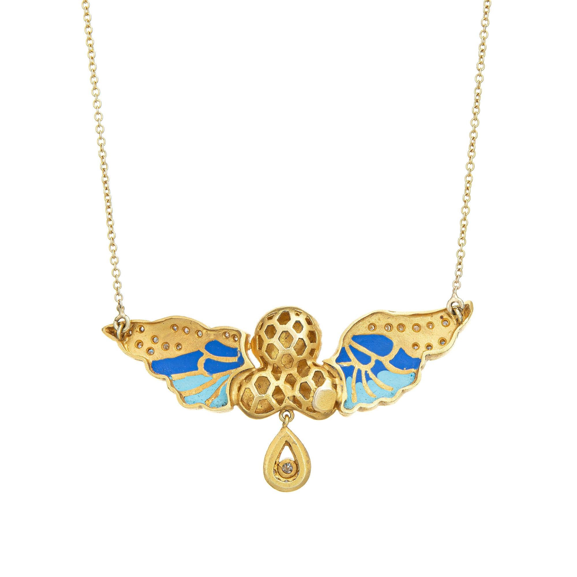 Stylish and finely detailed winged angel necklace crafted in 14k yellow gold.

Diamonds total an estimated 0.50 carats (estimated at H-I color and SI1-2 clarity).
The charming necklace features blue and turquoise enamel set into the wings, with the