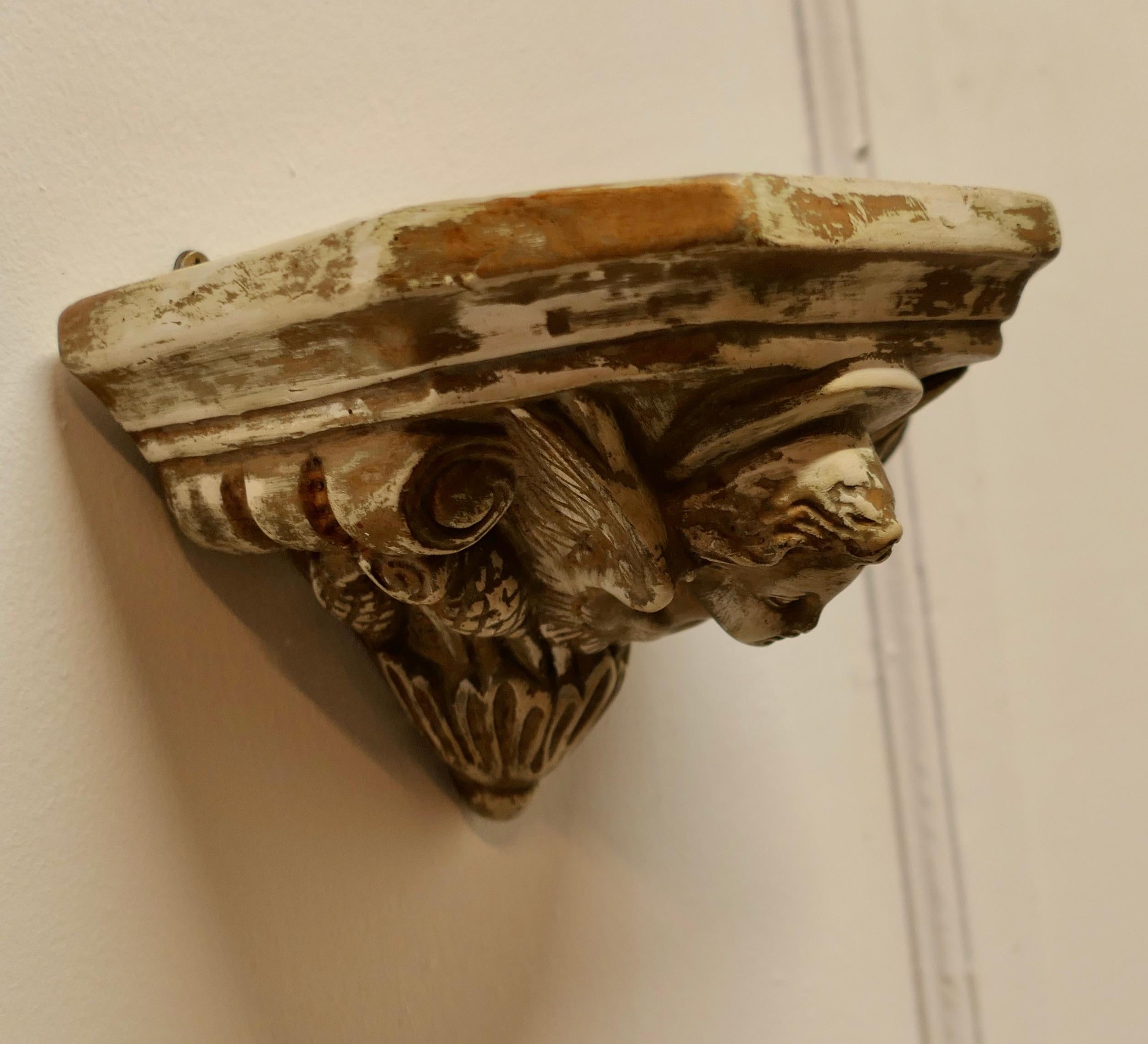 Plaster Winged Angel, Weathered Wall Bracket    For Sale