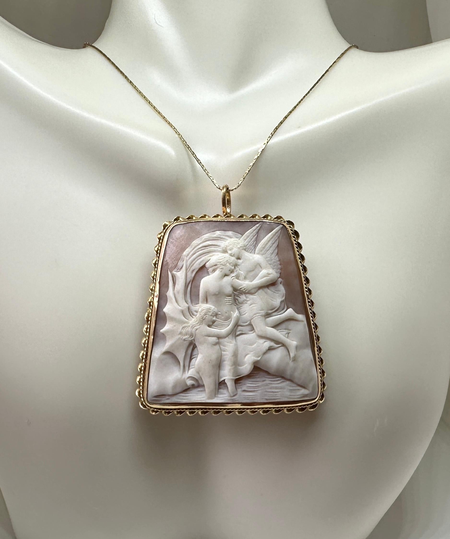 Indulge in a museum quality absolutely stunning and very rare large antique Shell Cameo Pendant Brooch with a hand carved image of two winged angels attending to a nude Goddess maiden!  The large neoclassical 2 inch tall cameo is set in an elegant