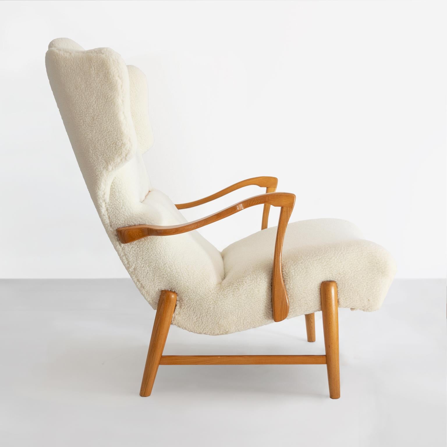 20th Century Winged Back Scandinavian Modern Lounge Chair in Faux Sheepskin Fabric
