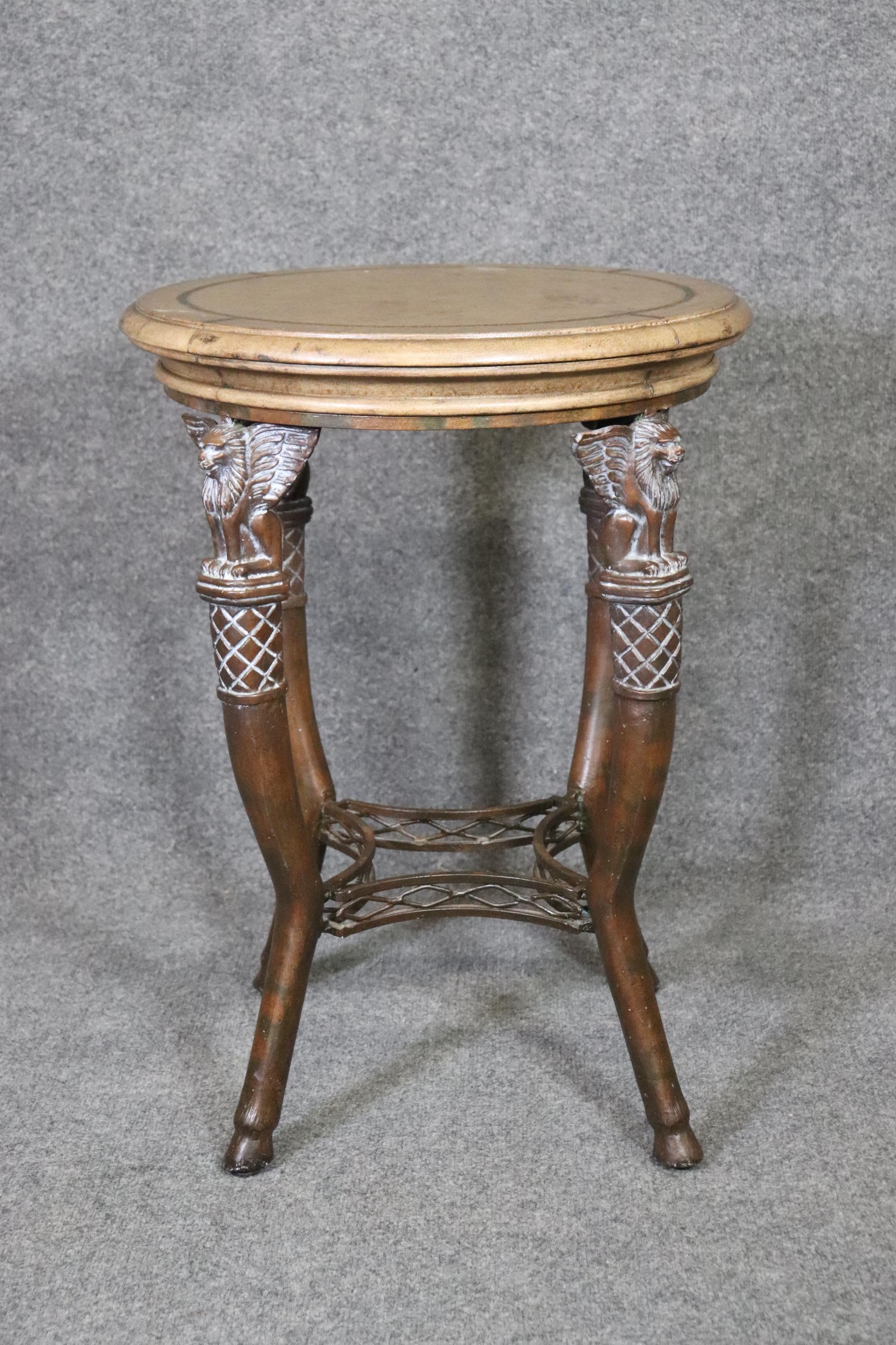 Dimensions- height: 27 1/4in diameter: 20 1/8in
This is an exceptional piece of Maitland Smith if you look closely you will see the attention to detail on the faux leather top and the gilt decoration along the border of the top. The base is