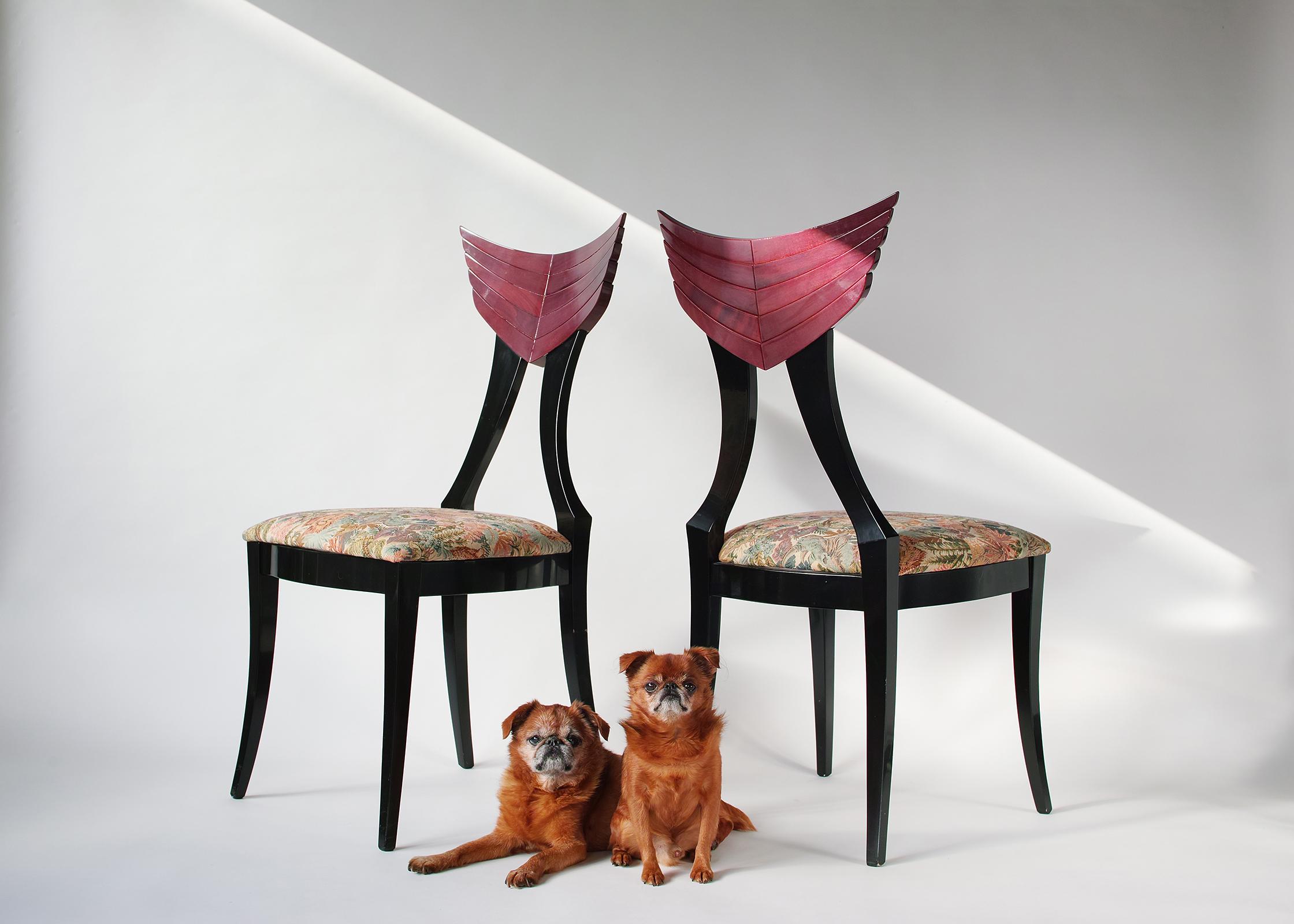 For your consideration is this all-original pair of side chairs by Pietro Constantini, Italy. The pair features solid wood frames; original black lacquered glossy finish; sculpted wing-form back rests with translucent purple lacquer; pastel jungle