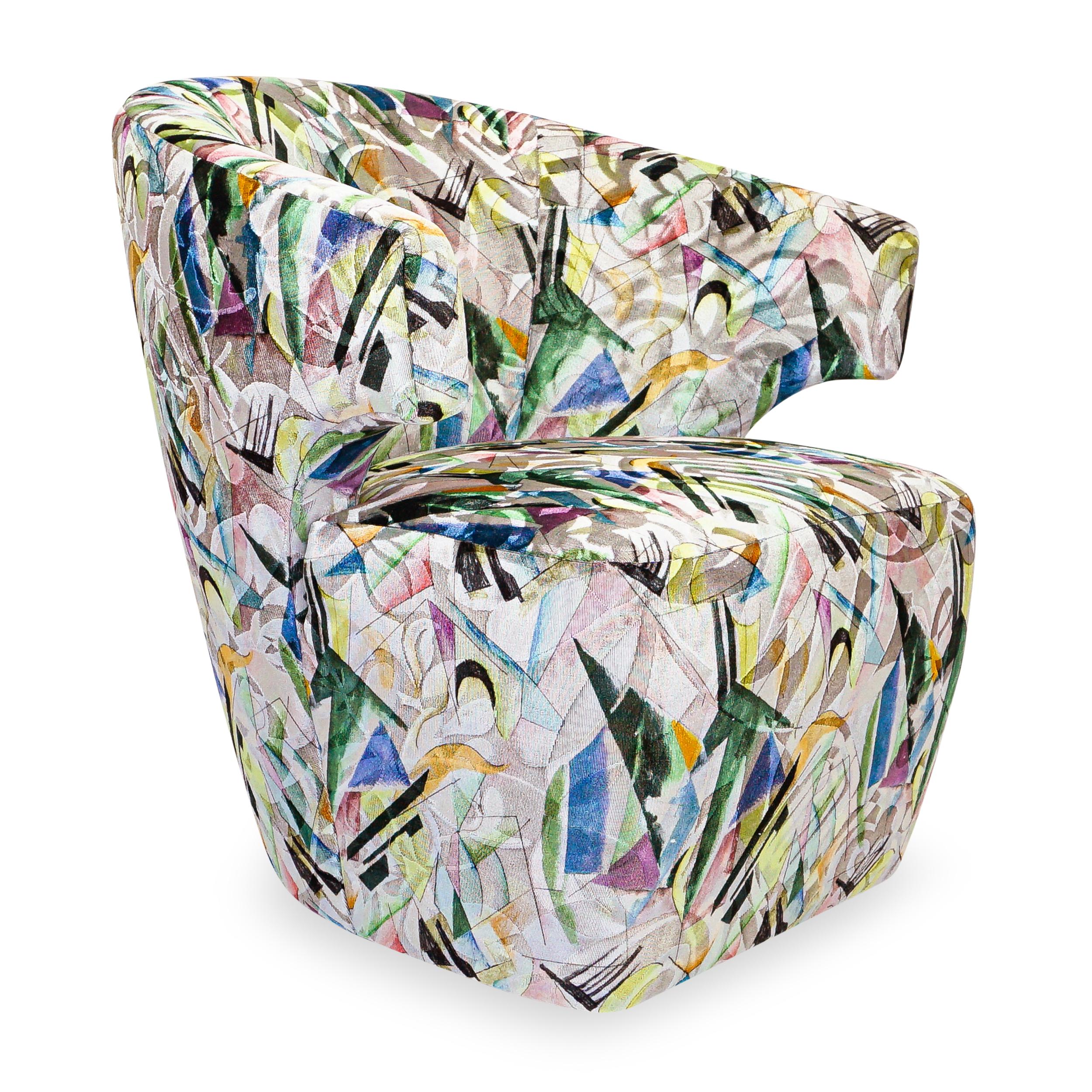 Featuring a popping bauhaus inspired cut and printed velvet, this winged swivel chair has a small stature but can comfortably seat taller and larger adults. The seat is firm and supportive and the slope of the back is 