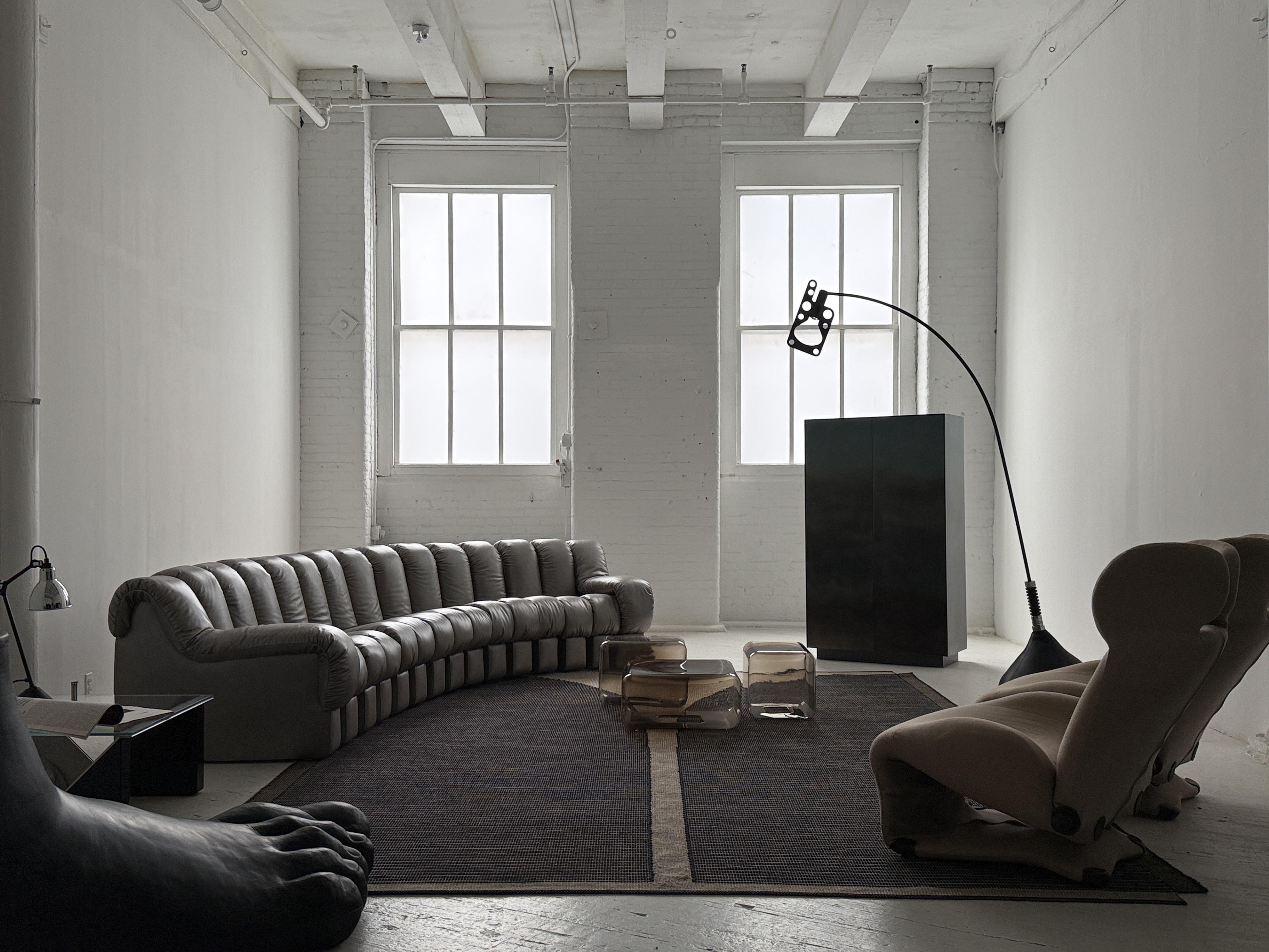 Designed in 1980 by Japanese master Toshiyuki Kita, the Wink Chair is a design icon that seamlessly blends Eastern influences with an elegant and refined aesthetic. This innovative and versatile seating piece, adjustable to multiple positions,