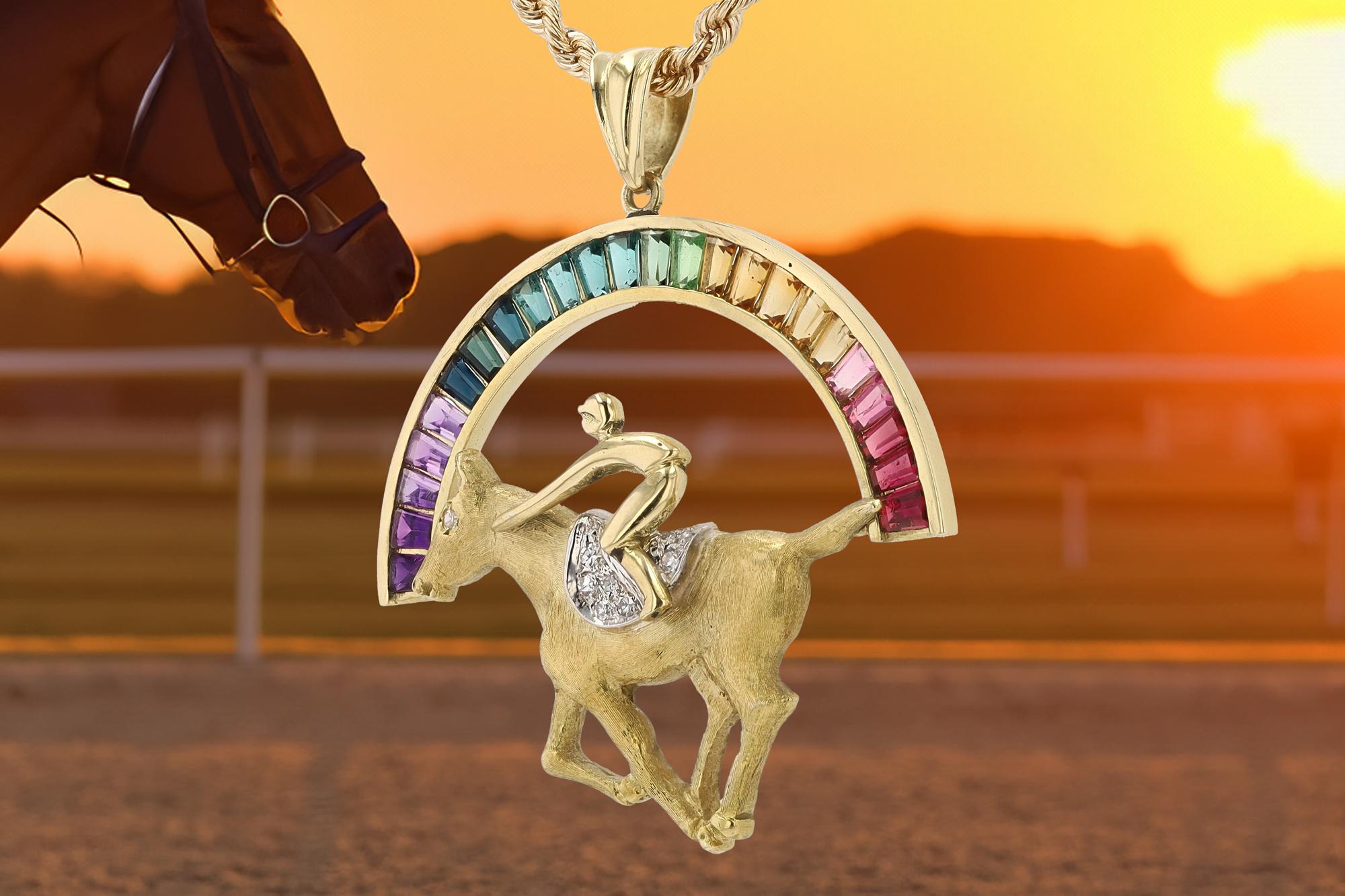 A fabulous thoroughbred horse racing necklace with a story. One of only 3 fillies to win the Kentucky Derby, Winning Colors, with jockey Gary Stevens riding to victory on a pavé diamond saddle below a 4 carat gemstone rainbow of tourmaline, amethyst
