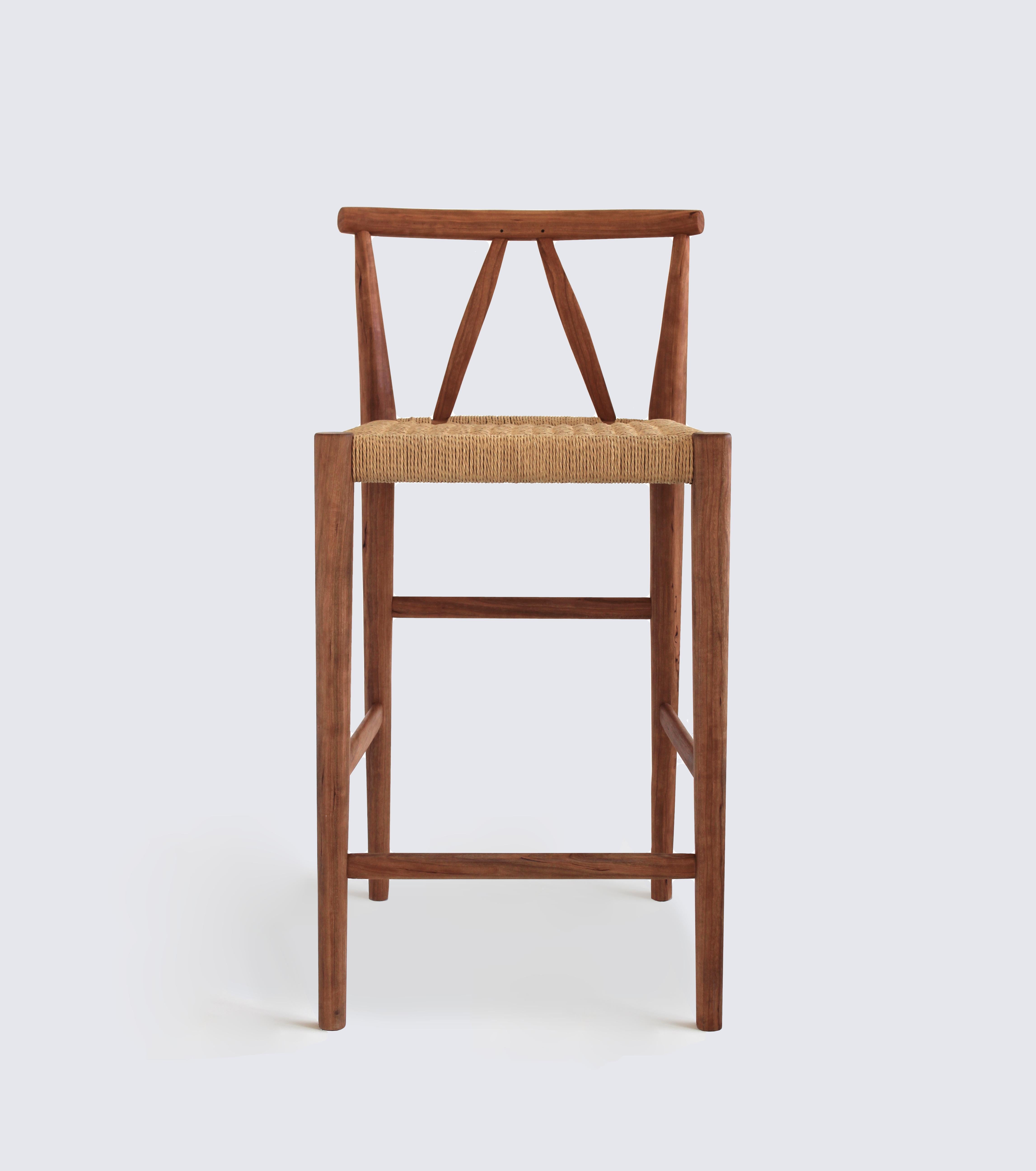 The Winona counter stool is a comfortable and elegant seating option for any kitchen island or bar. Each stool is joined, carved and shaped by hand to produce a strong and lightweight structure. The Danish cord seat is woven directly to the stool's