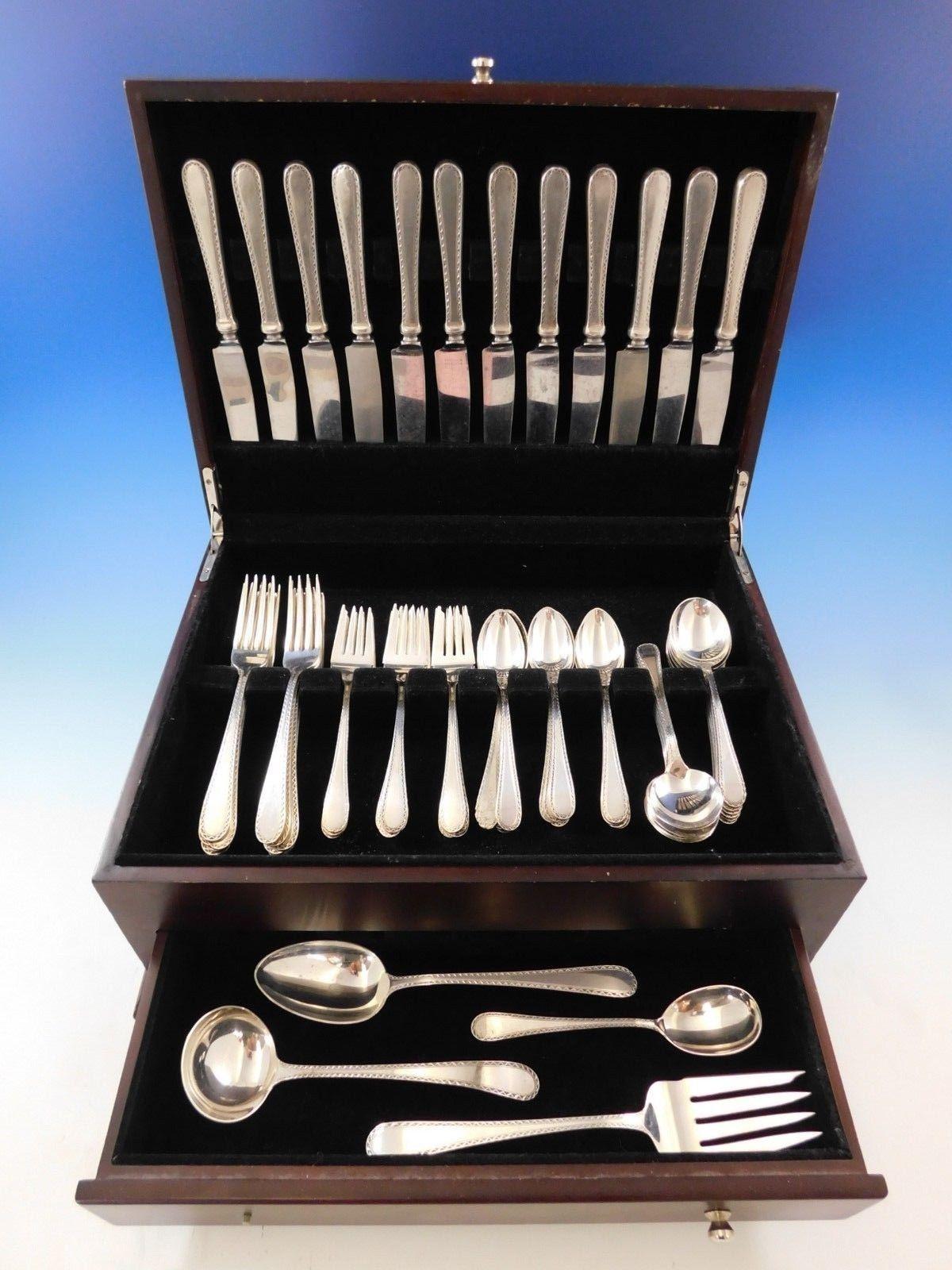 Lovely winslow by Kirk Sterling silver flatware set - 64 pieces. This set includes:

12 knives, 9
