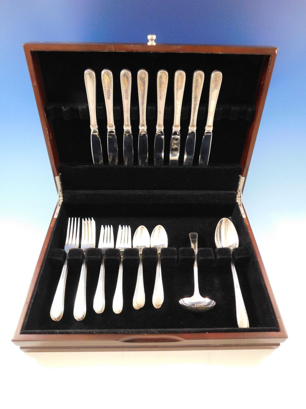 Gorgeous Winslow by Kirk Sterling Silver Flatware set, 35 pieces. This set includes:

8 Knives, 9