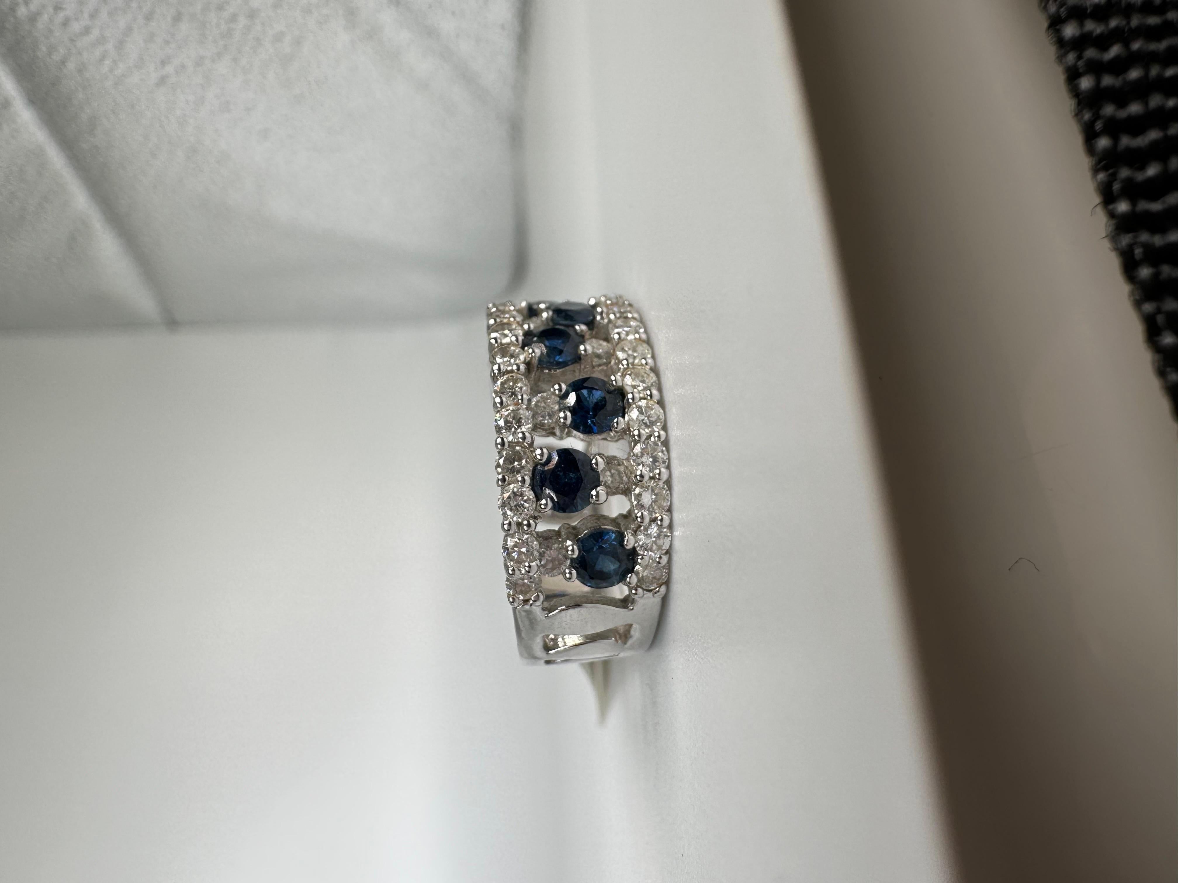 Winter garden diamond and sapphire ring in 18KT gold, sapphires weighing 1.04 carats with beautiful blue color.

METAL: 18KT gold
NATURAL DIAMOND(S)
Clarity/Color: SI/G
Carat:1.28ct
Cut:Round Brilliant
Grams:7.33
size: 6
Item20000085 

WHAT YOU GET