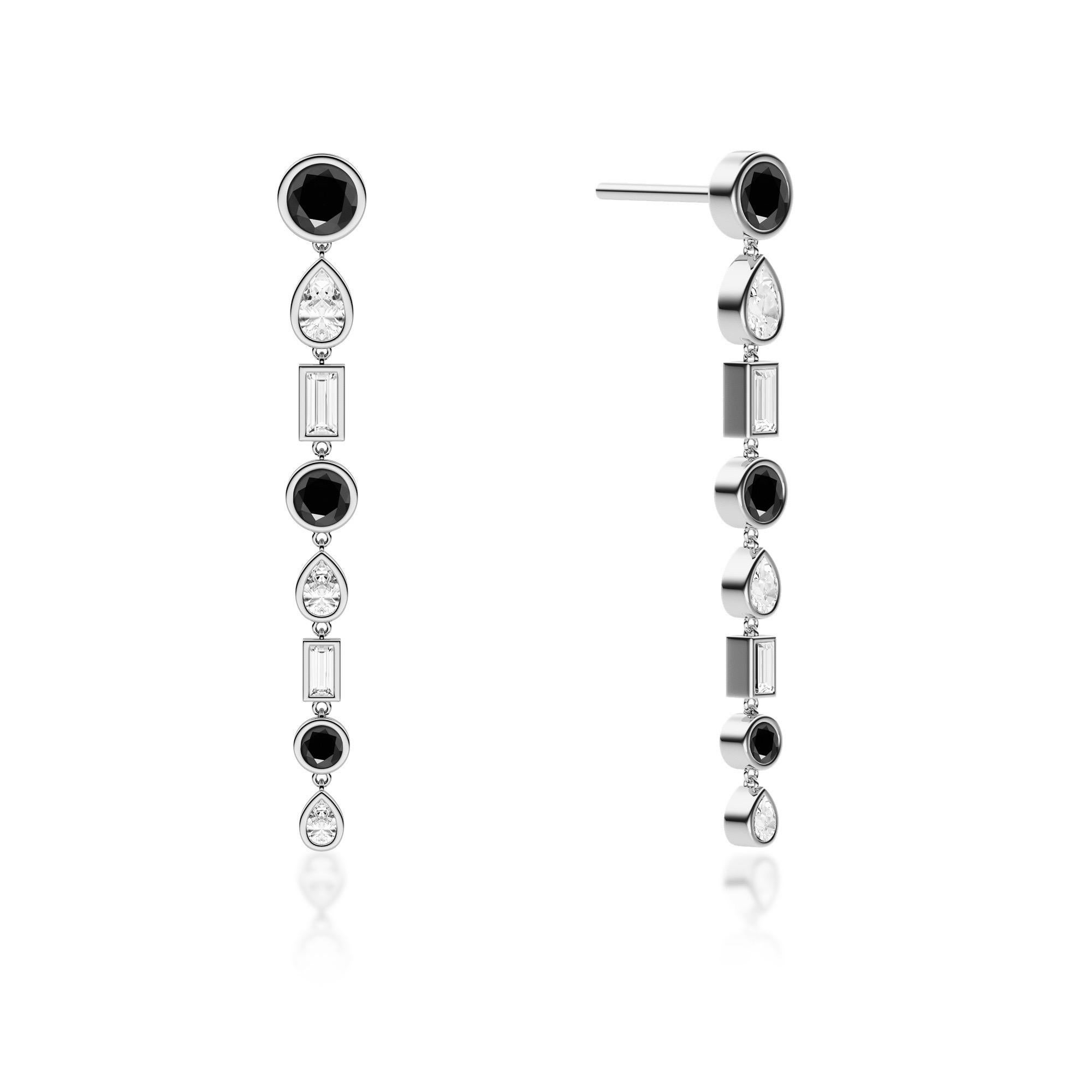 Ruben Manuel Designs “Winter” Earrings.  
18K WG drops w/VS graduated white pear & baguette diamonds, featuring round black diamonds.  3.15 ctw.