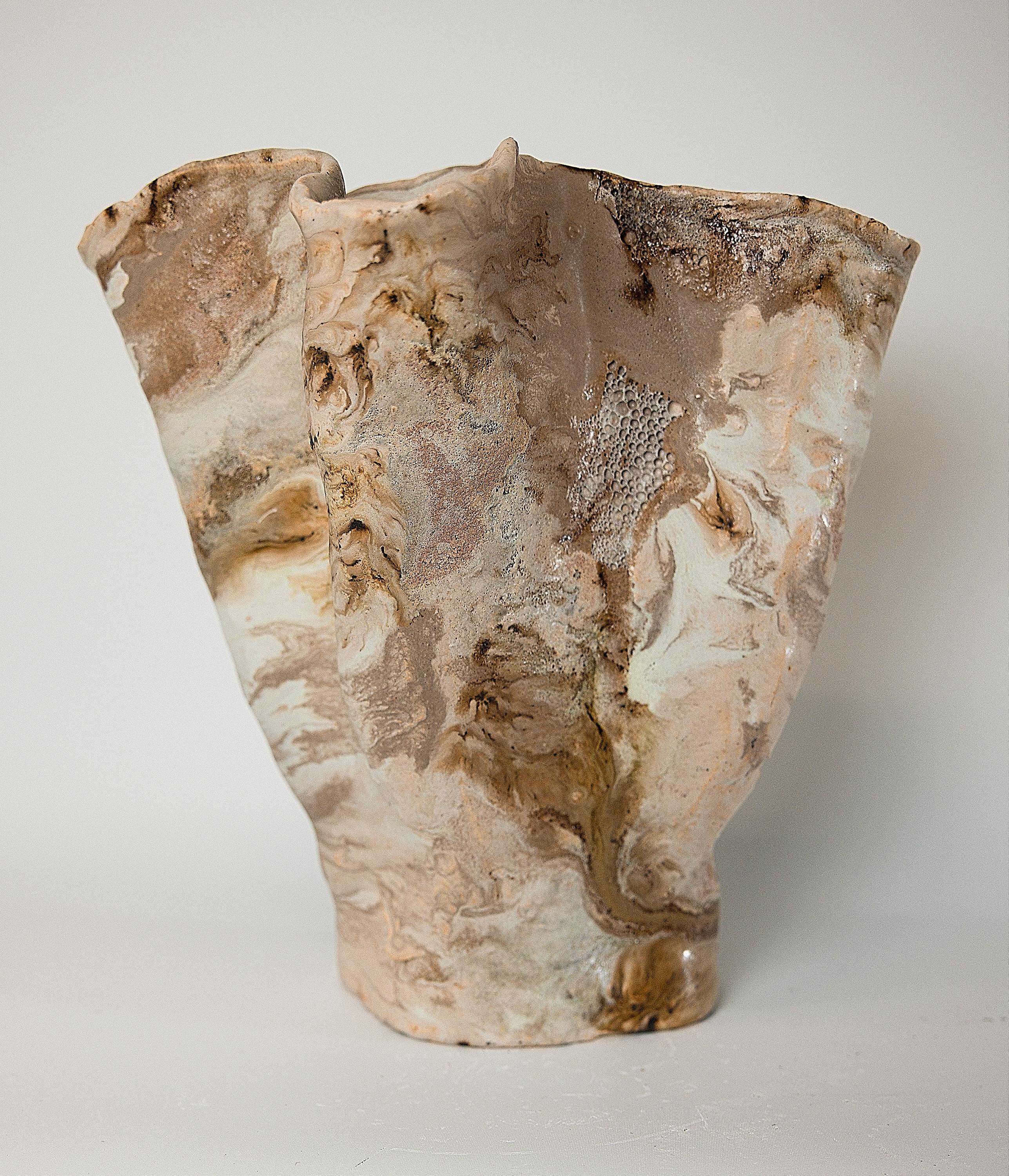 Elevate your home décor with our Tall Winter Wood Vessel, an organic winter woods tall handmade vase that works amazingly for branches and large arrangements. These hand-sculpted vases, created using freehand coil techniques, are adorned with varied