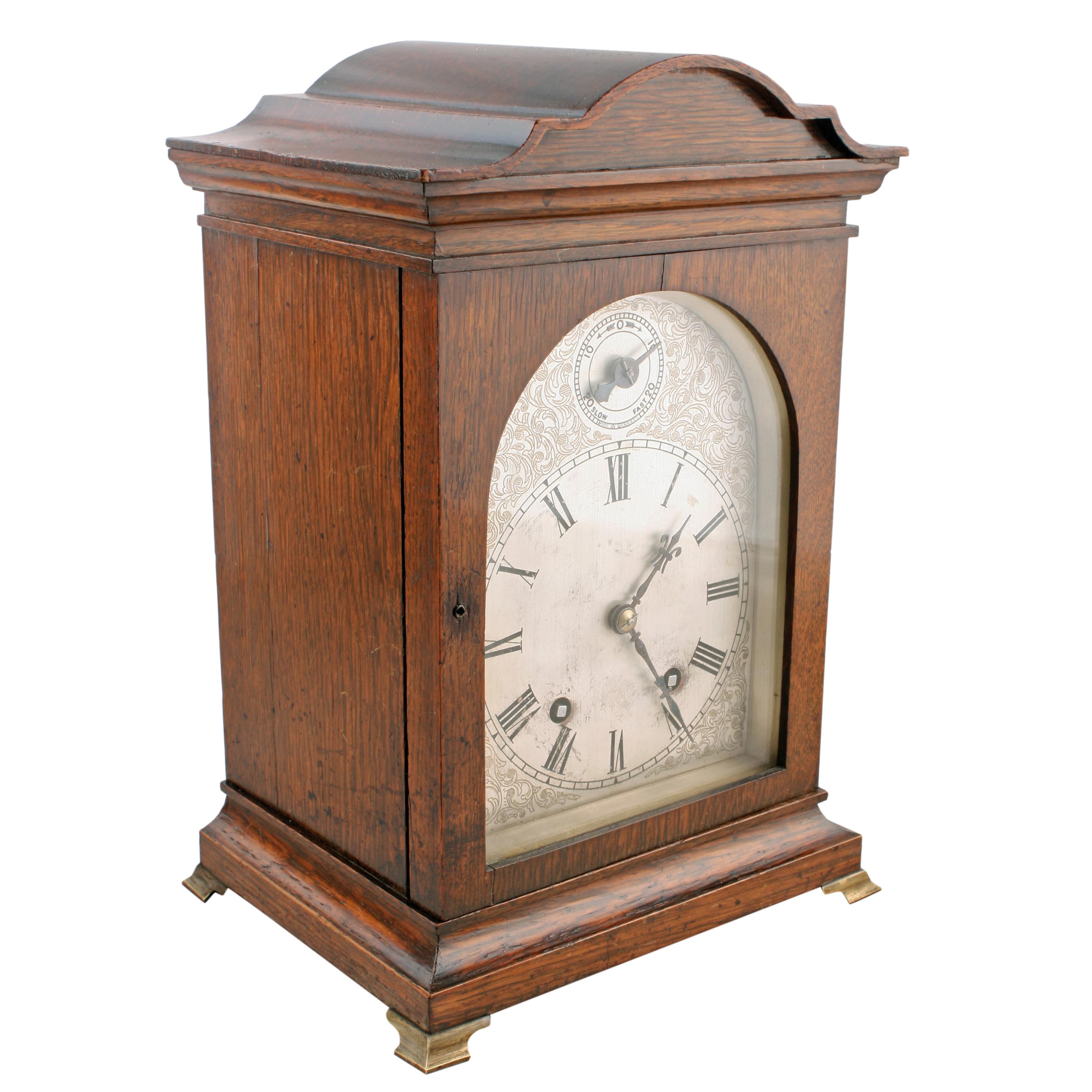 A late 19th to early 20th century oak cased mantel clock by Winterhalder and Hofmeier.

The clock has an eight day movement that strikes the hour and quarters on a pair of spiral gongs.

The works are stamped 