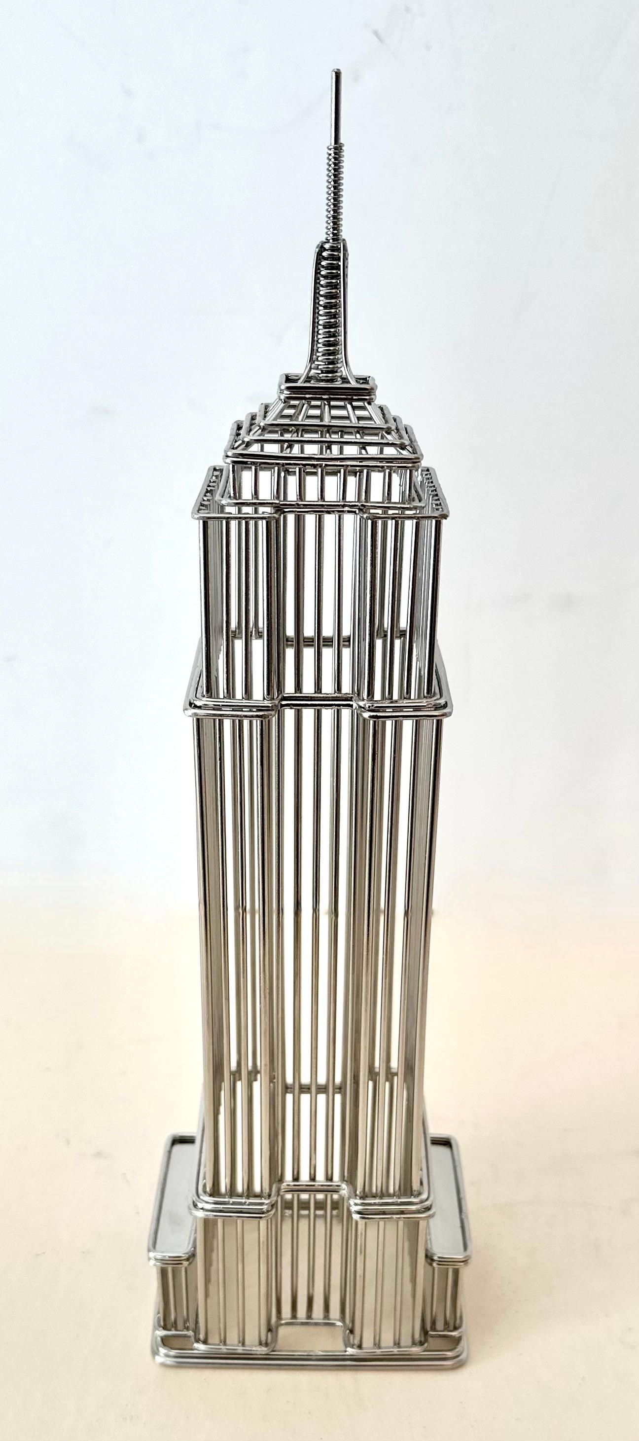 Wire sculpture of NYC Empire State Building - a simple and great piece - a compliment to any shelf or desk - a great size for a small filler piece.