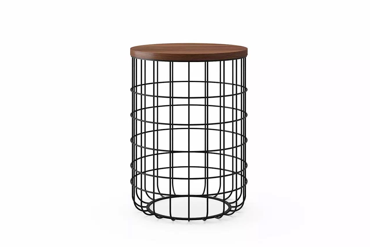 Wire tall side table by Dare Studio, 2009
Dimensions: H 55 cm, D 40 cm
Materials: American black walnut, powder coated frame in black RAL 9005

Also available in European white oak.

Dare Studio is a British design company producing award