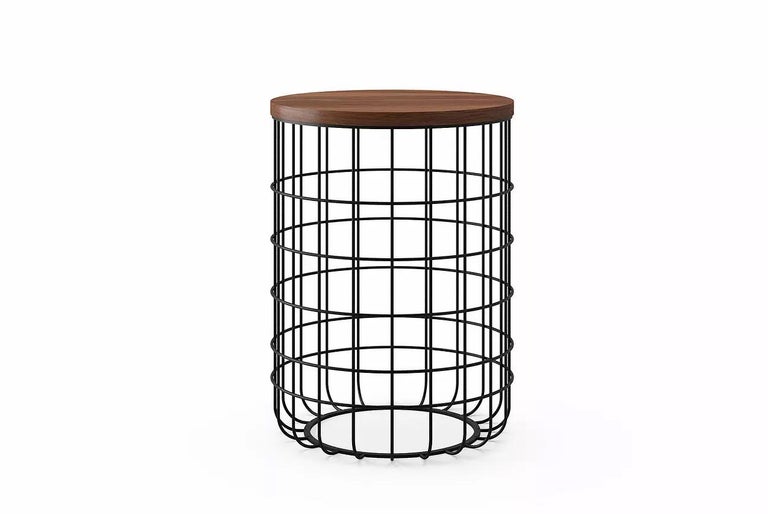 Wire tall side table by Dare Studio, 2009
Dimensions: H 55 cm, D 40 cm
Materials: American black walnut, powder coated frame in black RAL 9005

Also available in European white oak.

Dare Studio is a British design company producing award