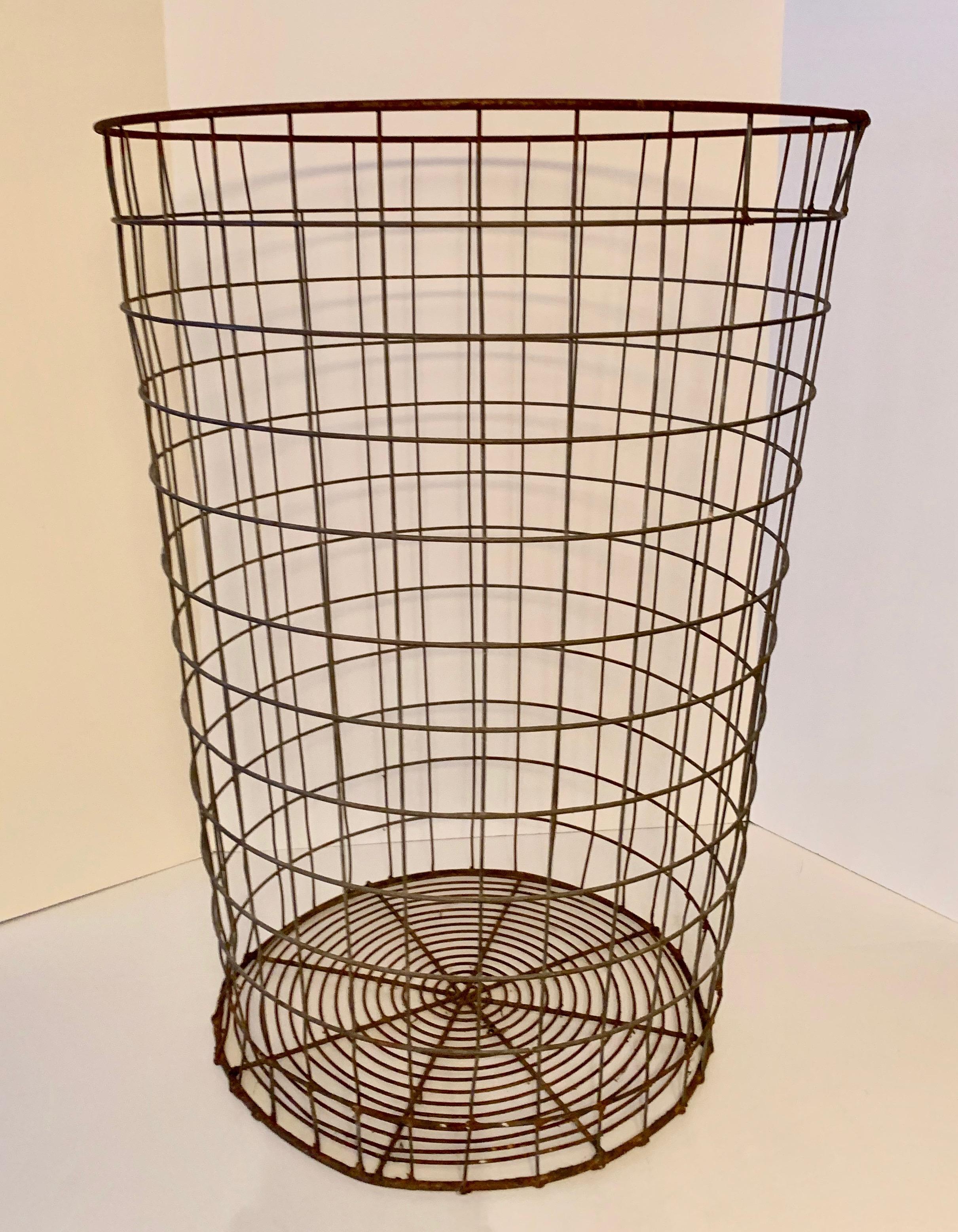 Wire trash can - Industrial and practical, yet artistic and architectural - the can will hold anything from trash to rolled drawings, laundry, or multiples of balls or sports pieces. We would also recommend powder coating or plating the piece to